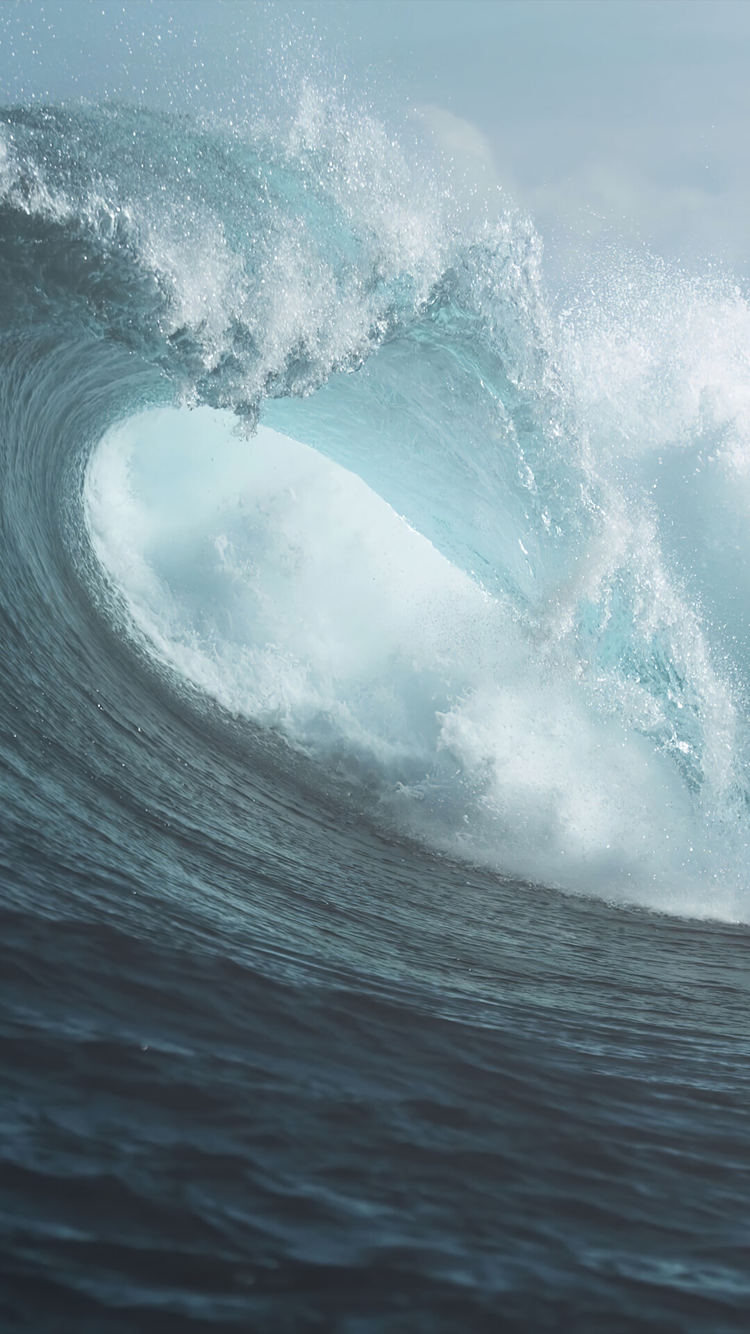 A large ocean wave crests and breaks HD Phone Wallpaper