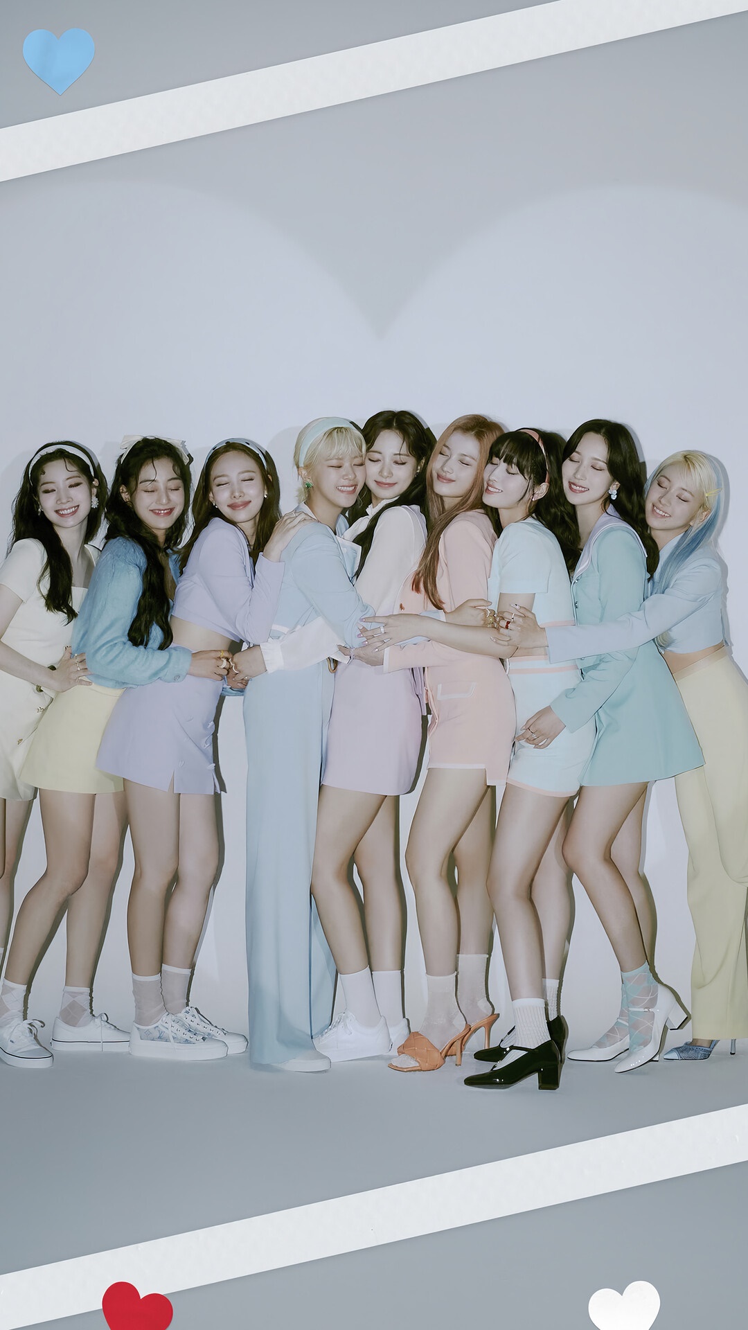 TWICE Kpop group members in pastel outfits HD Phone Wallpaper