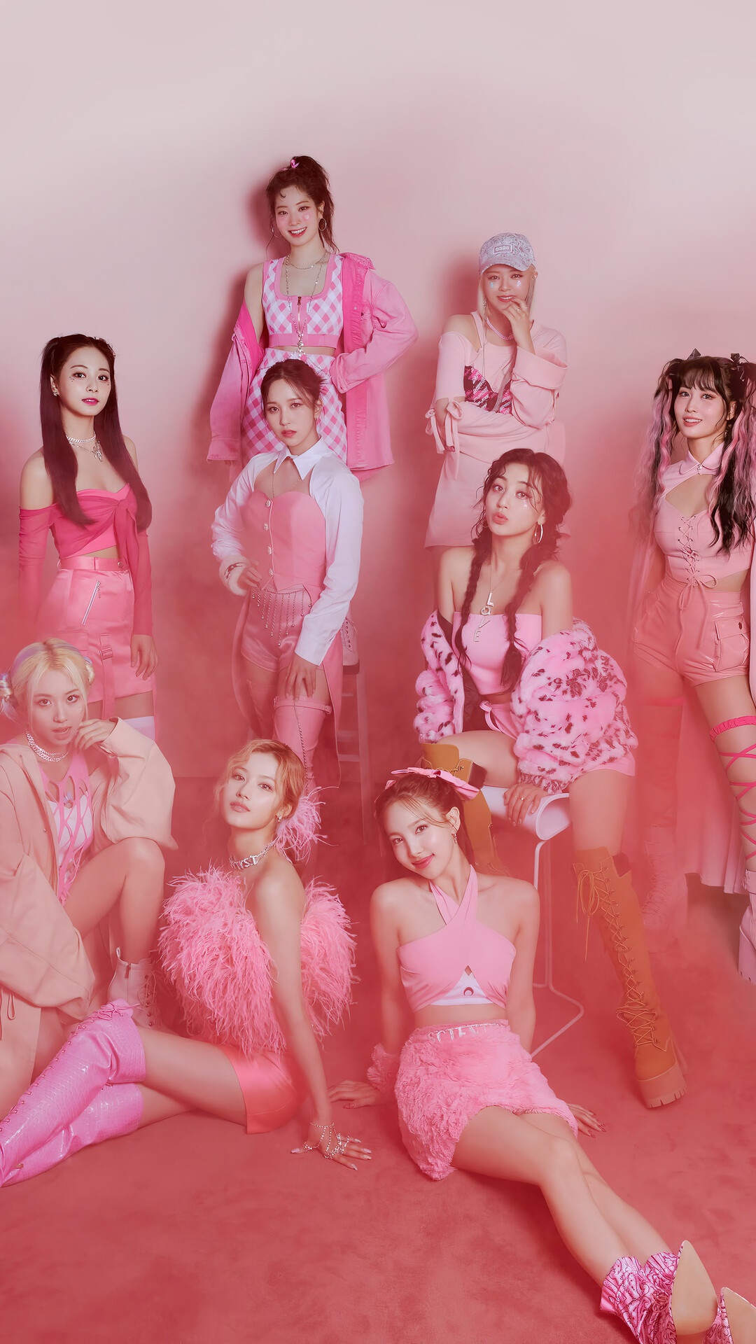 TWICE Kpop group members in pink outfits HD Phone Wallpaper