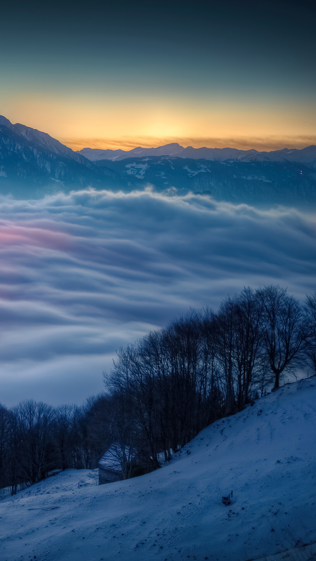 Mountain range above clouds at sunset HD Phone Wallpaper