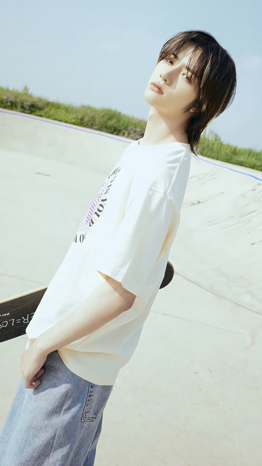 Beomgyu from TXT with a skateboard HD Phone Wallpaper