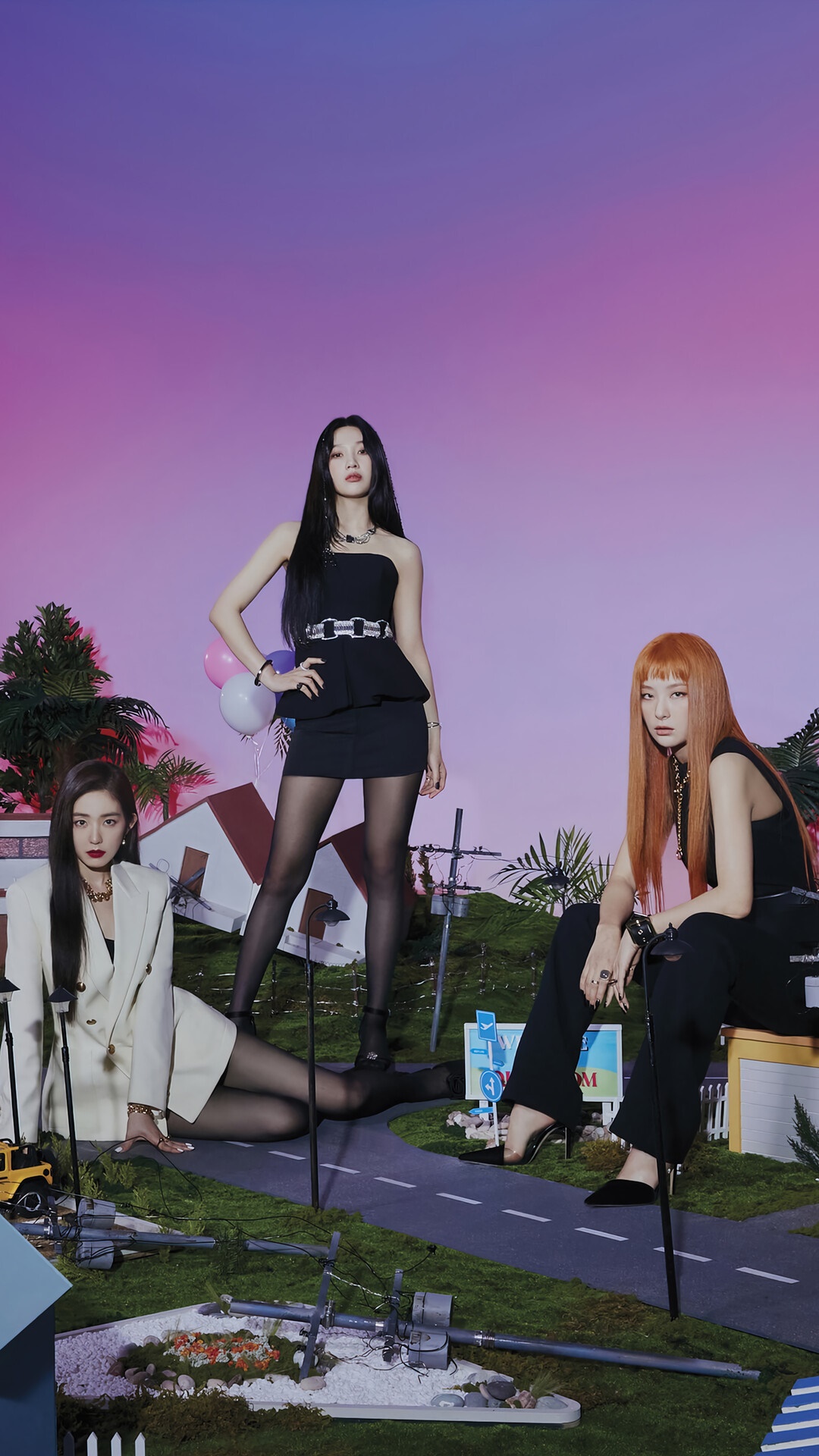 Red Velvet members posing in a miniature town setting HD Phone Wallpaper
