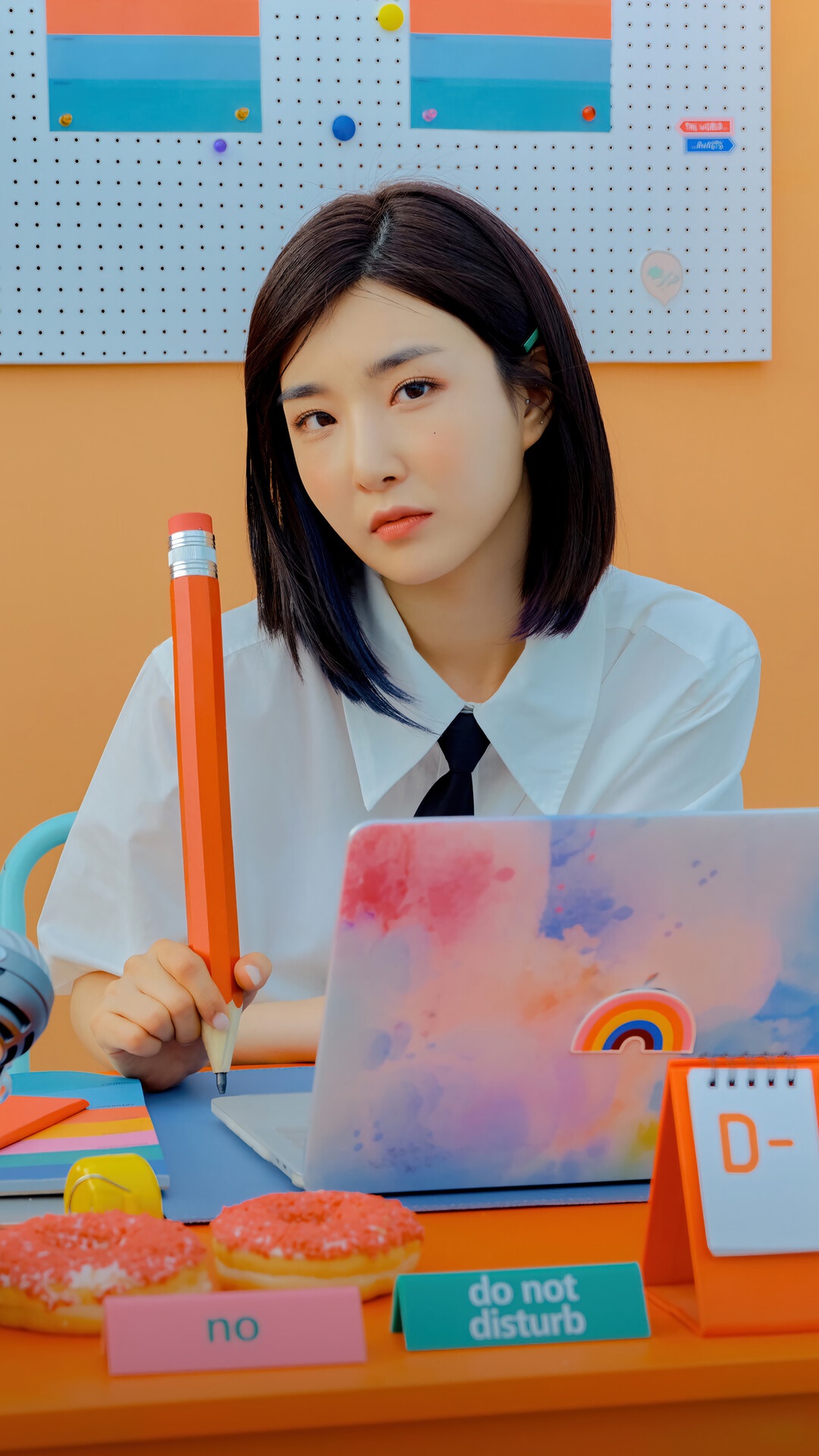 Yuna from Brave Girls holding a large pencil HD Phone Wallpaper