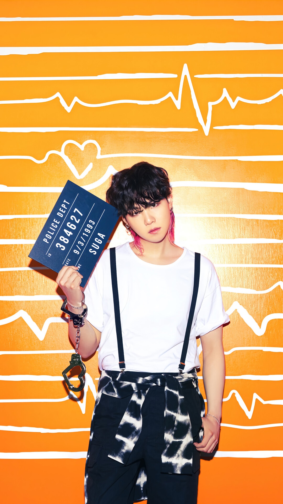 Suga from BTS holding a mugshot sign HD Phone Wallpaper