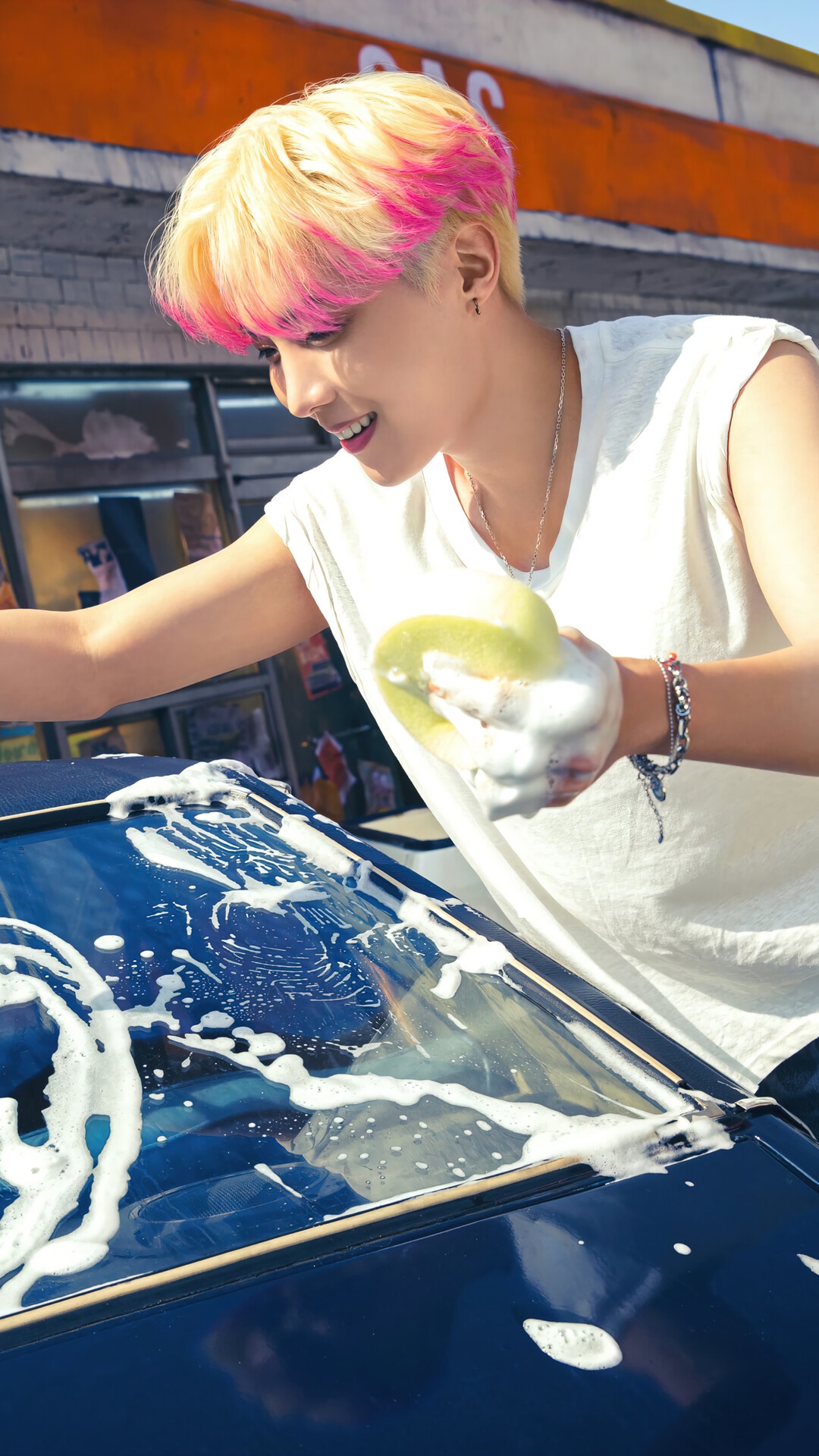 J-Hope from BTS washing a car HD Phone Wallpaper