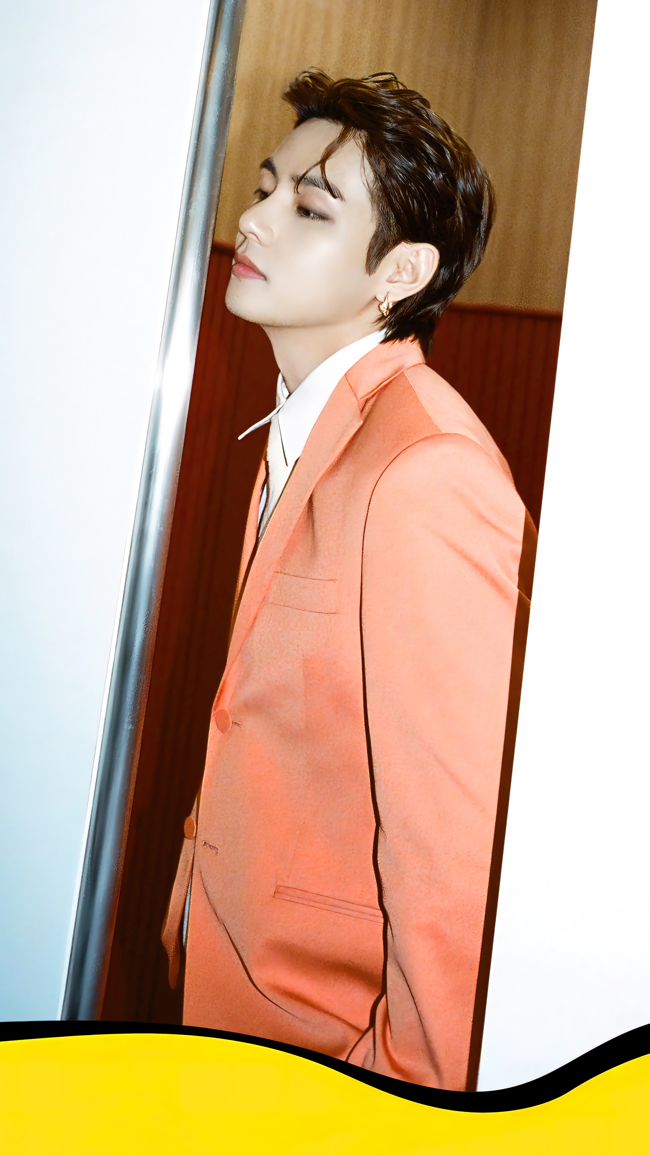 V from BTS wearing an orange suit HD Phone Wallpaper