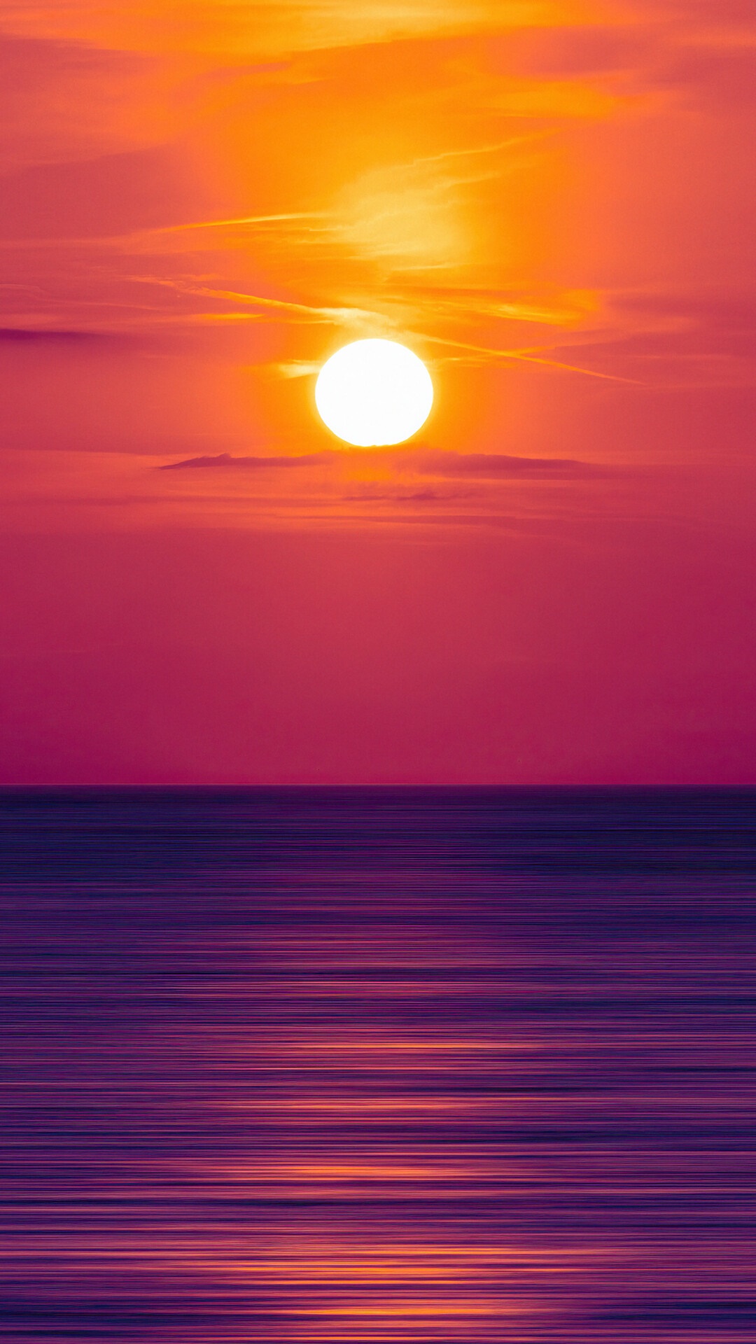 Sunset over the ocean with vibrant colors HD Phone Wallpaper