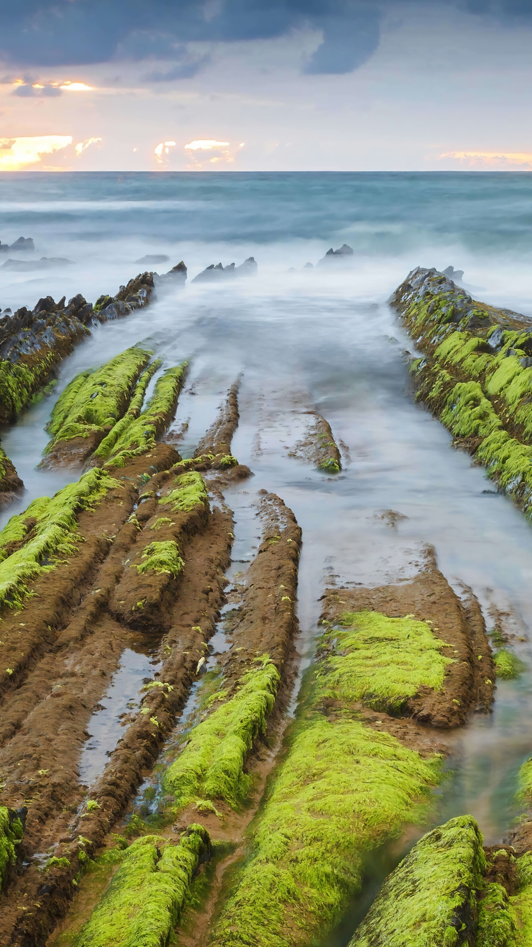 Mossy rocks in the ocean at sunrise HD Phone Wallpaper