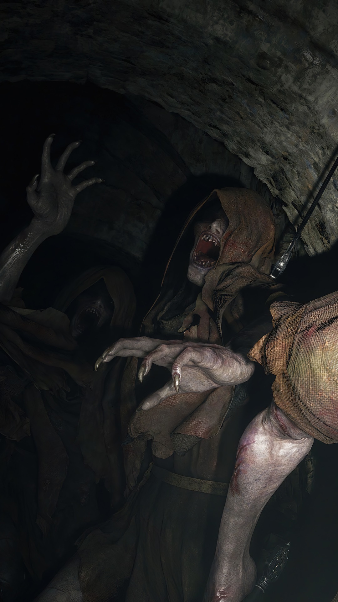 Resident Evil Village vampire creatures in a dark cave HD Phone Wallpaper