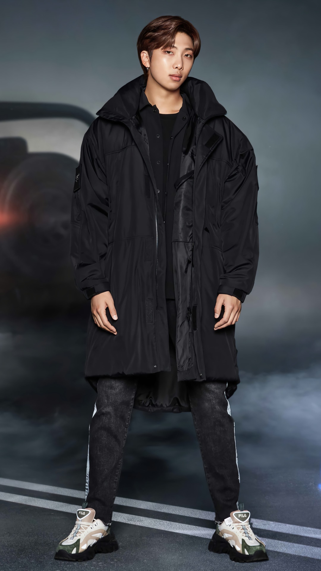 RM from BTS posing in a black coat and jeans HD Phone Wallpaper