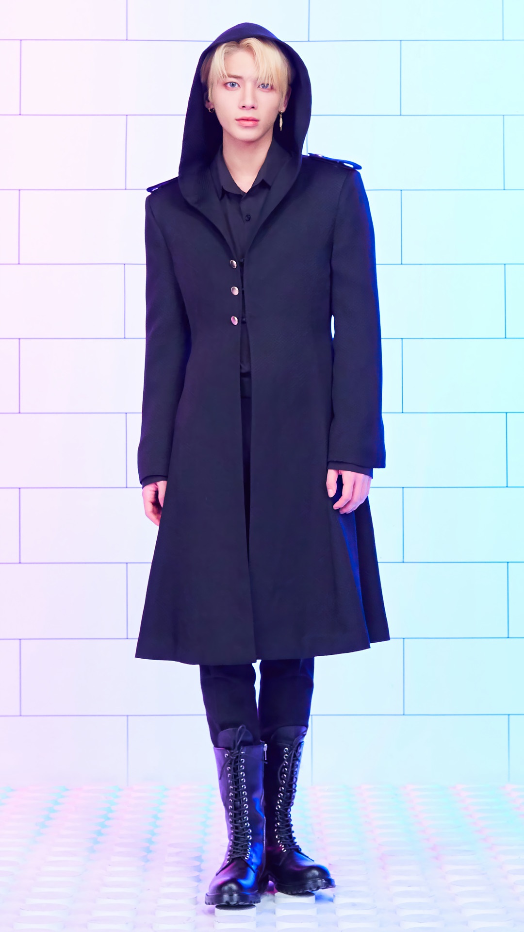 Taehyun from TXT wearing a black hooded coat HD Phone Wallpaper