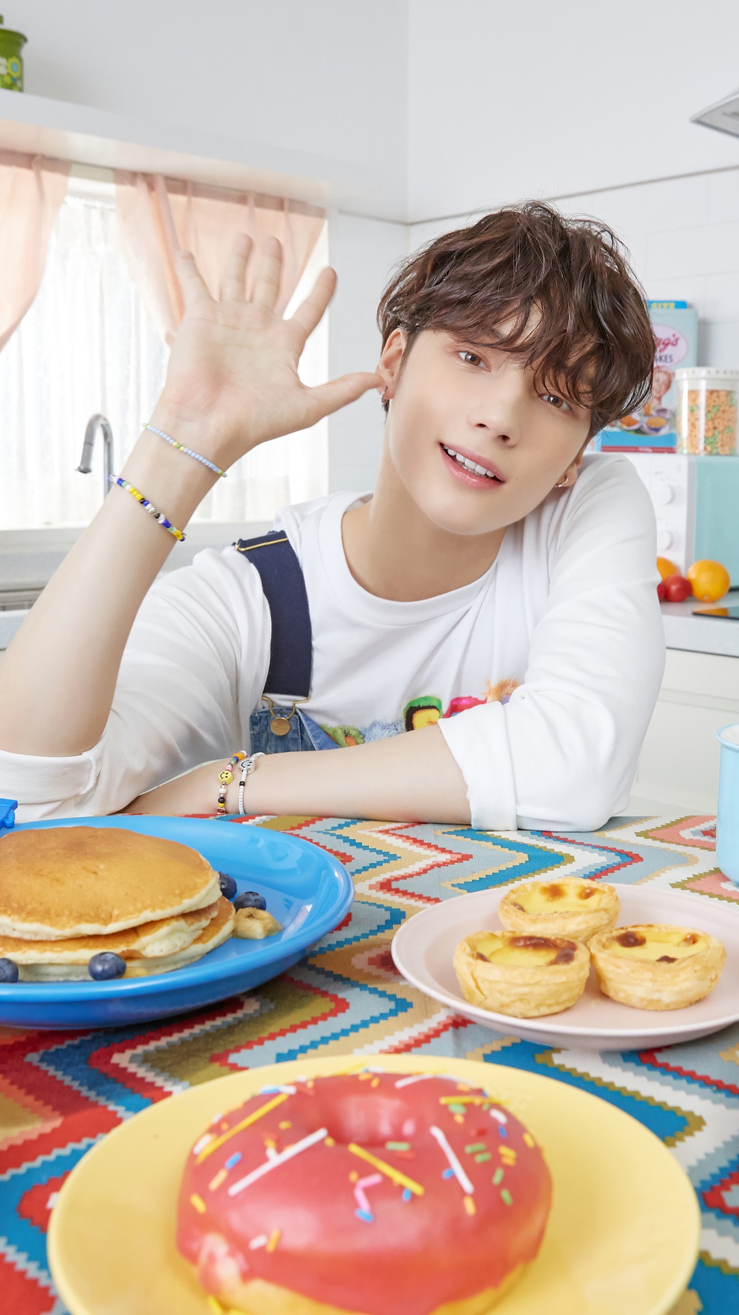 Huening Kai from TXT with breakfast foods HD Phone Wallpaper