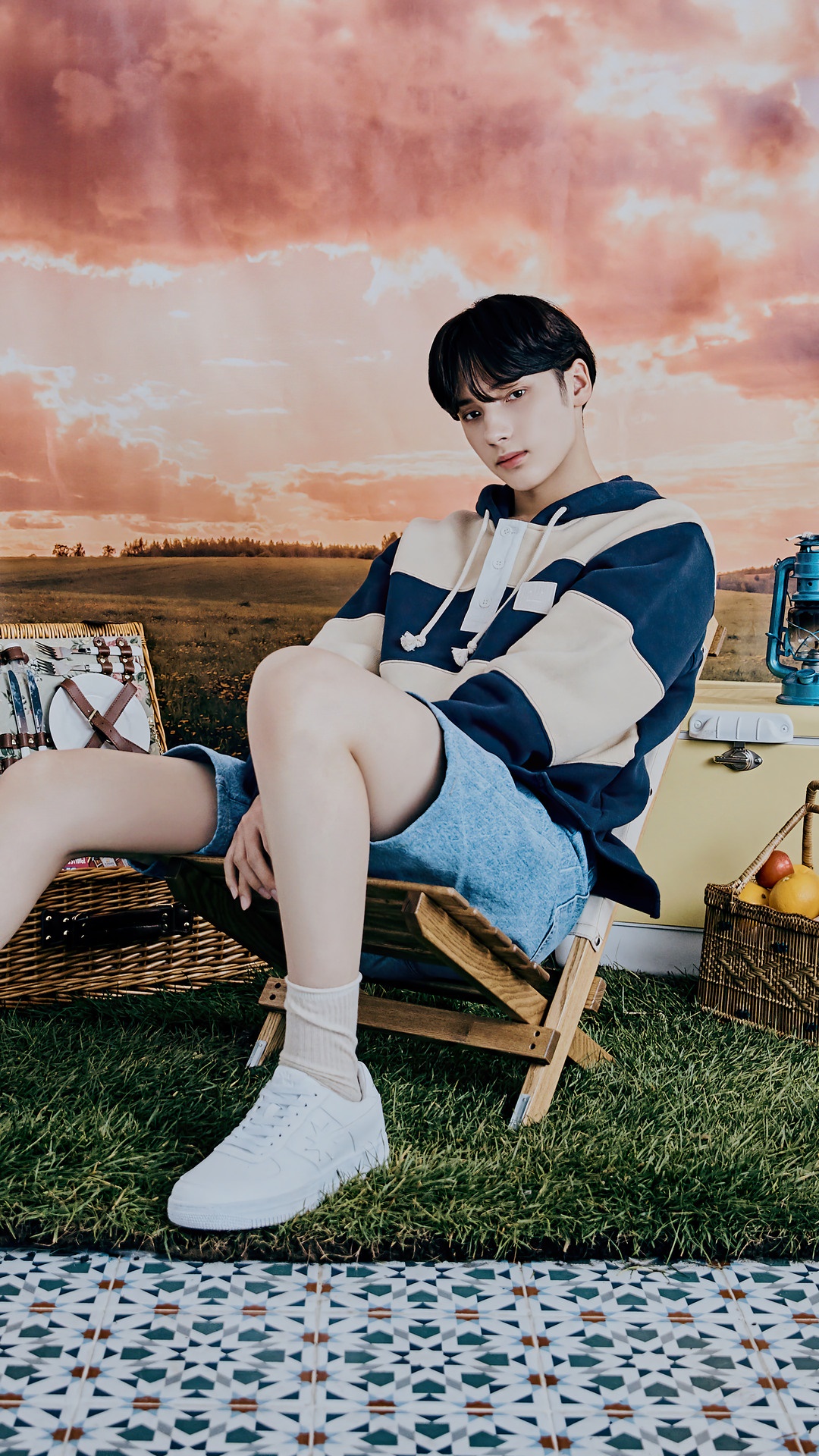 Huening Kai from TXT in a picnic photoshoot HD Phone Wallpaper