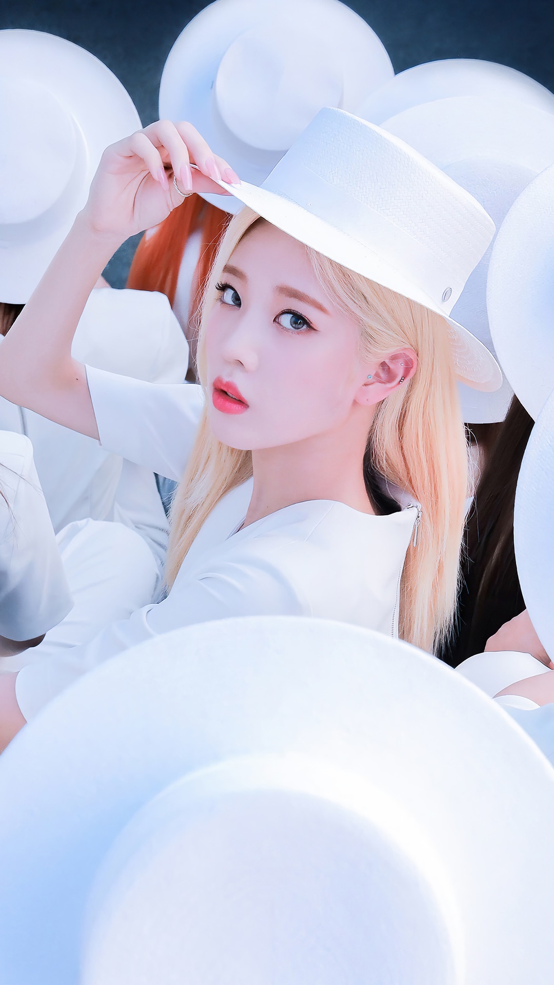 Kim Lip from Loona wearing a white hat HD Phone Wallpaper
