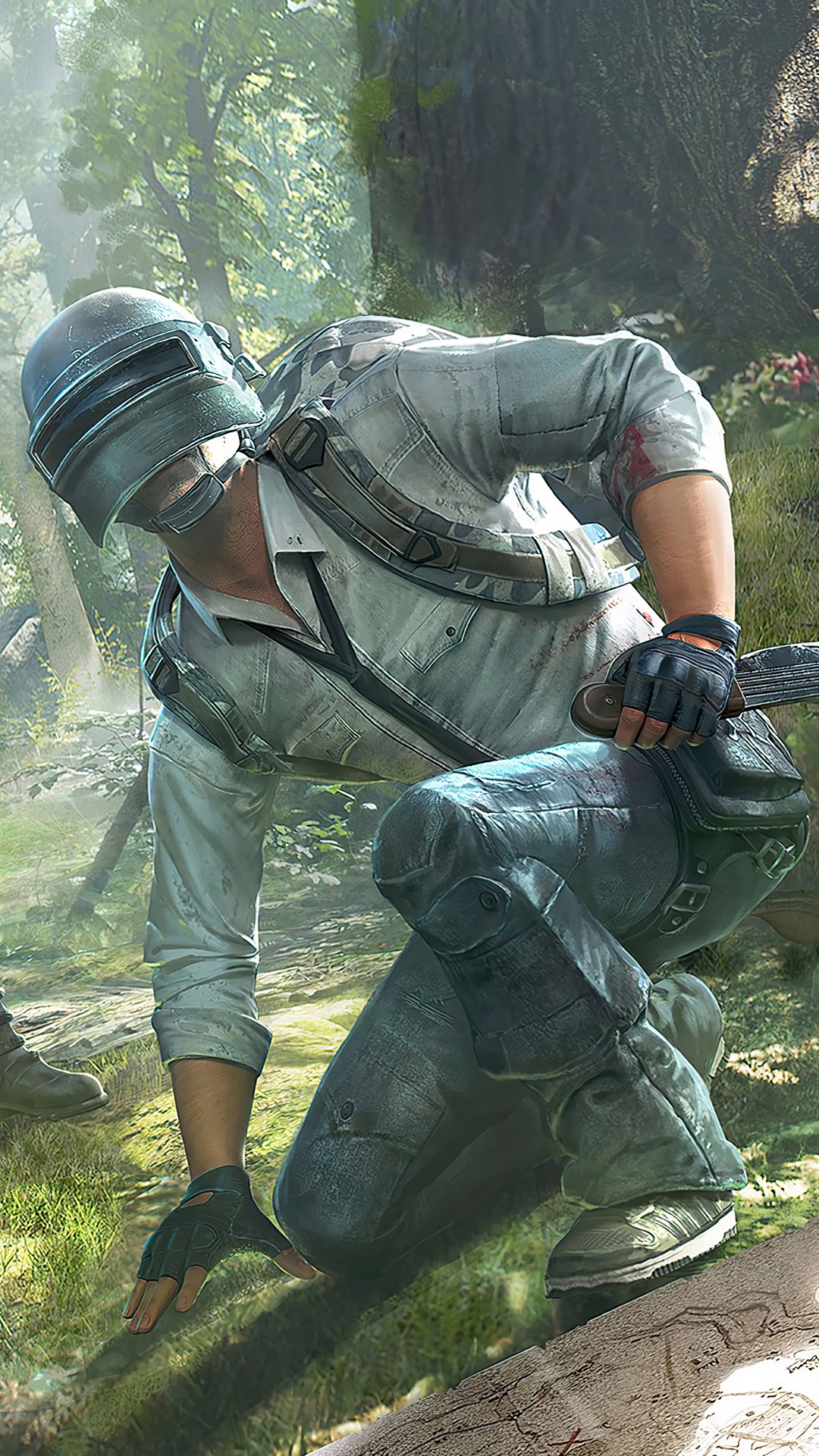 Player in PUBG armor crouches in a forest HD Phone Wallpaper