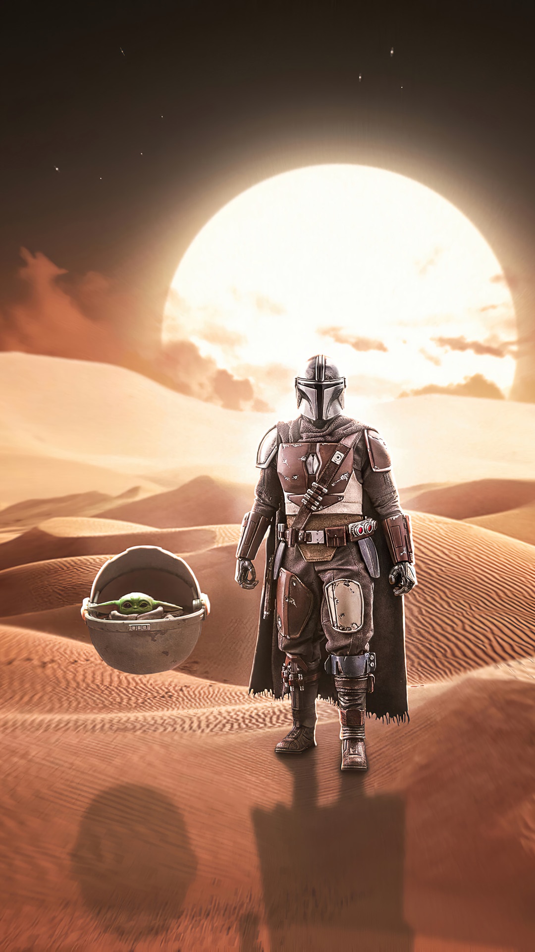 The Mandalorian and Grogu in a desert landscape HD Phone Wallpaper