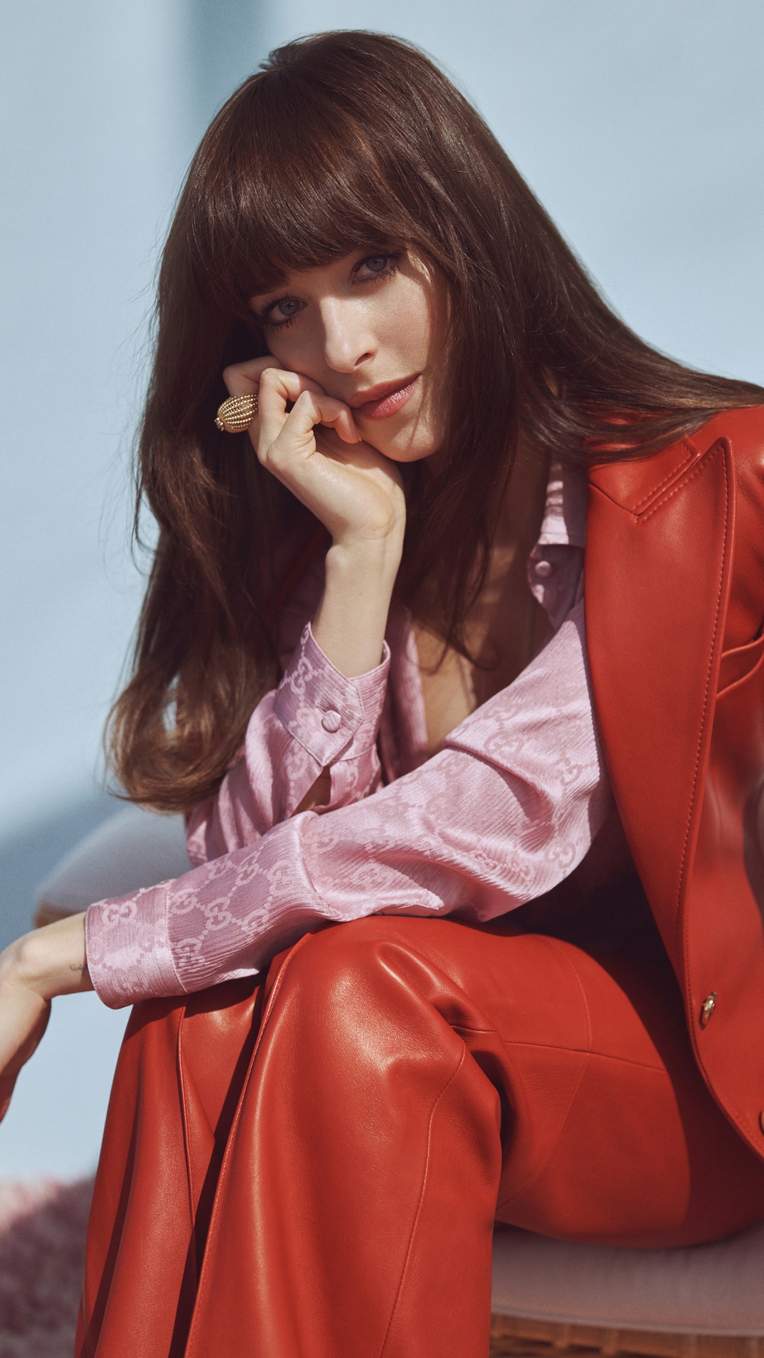 Dakota Johnson in red leather suit and pink Gucci shirt HD Phone Wallpaper