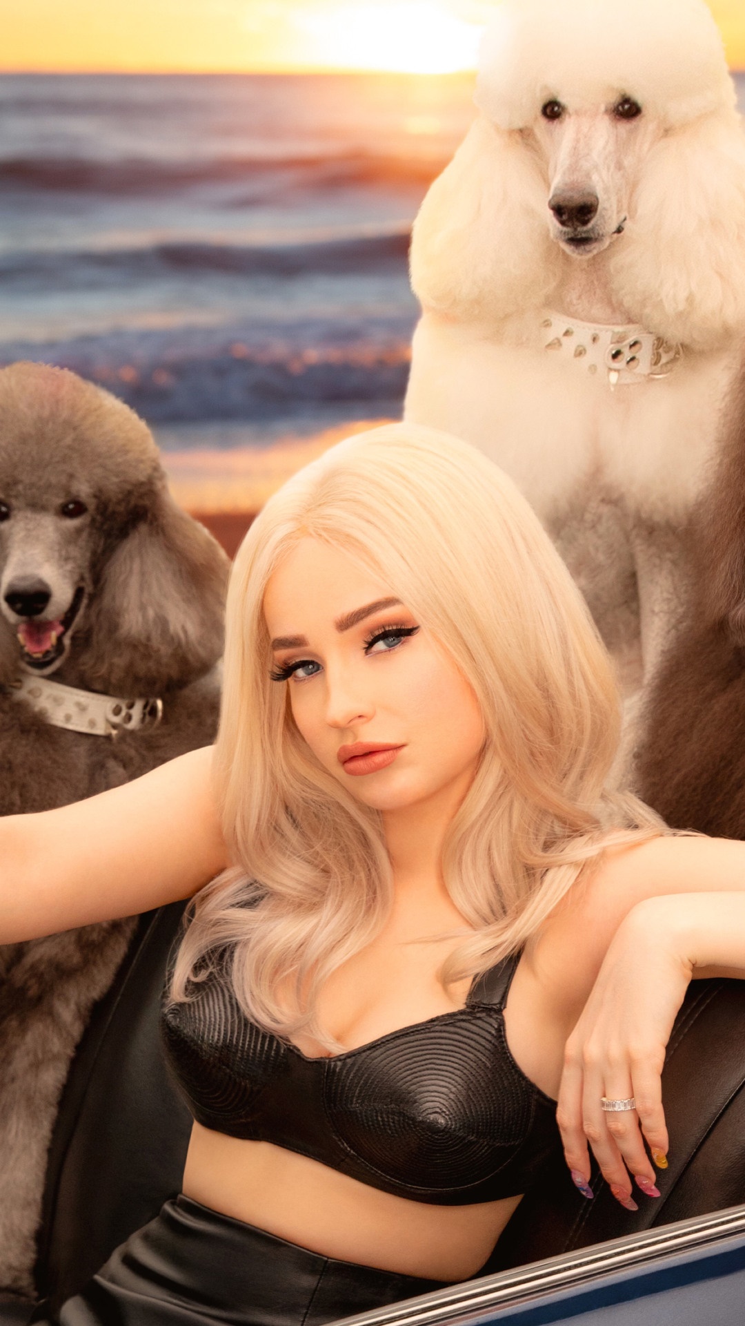 Kim Petras with poodles on a beach HD Phone Wallpaper