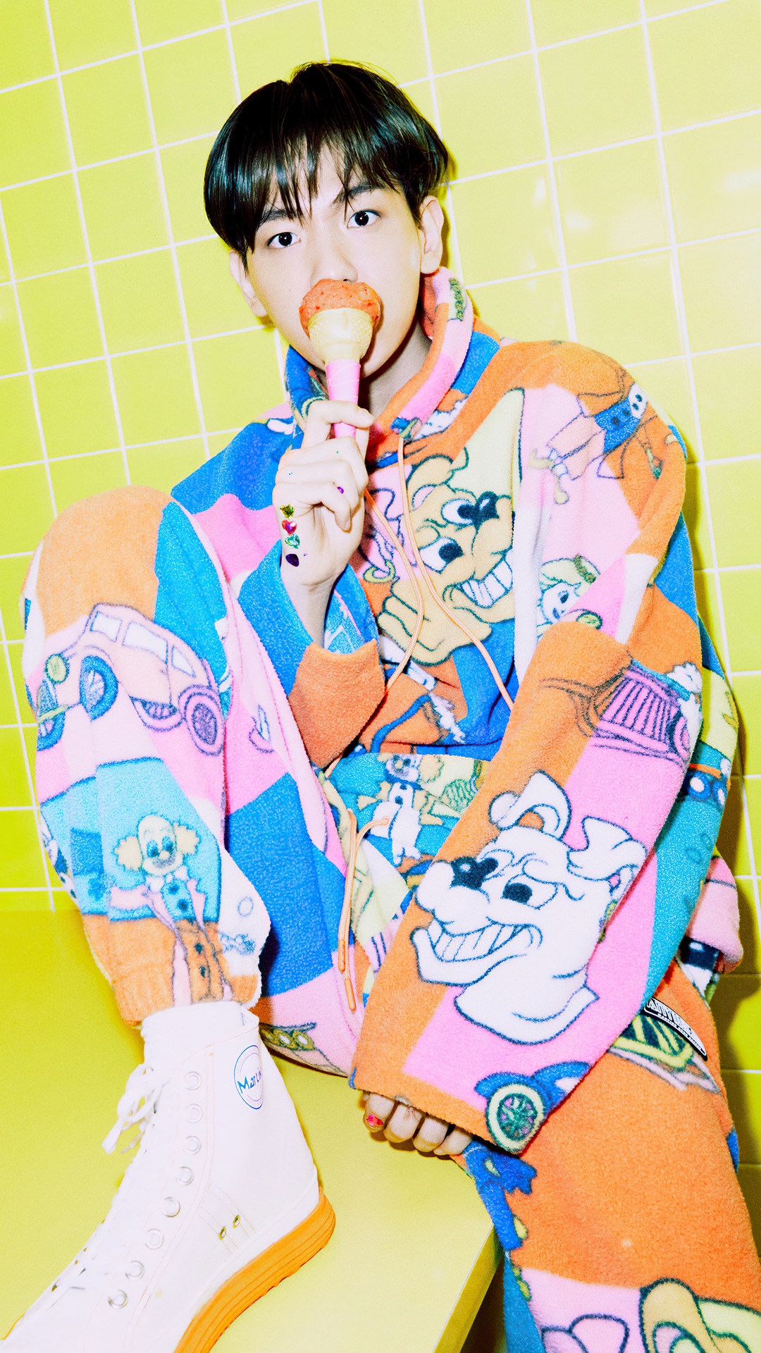 Baekhyun eating ice cream in colorful outfit HD Phone Wallpaper