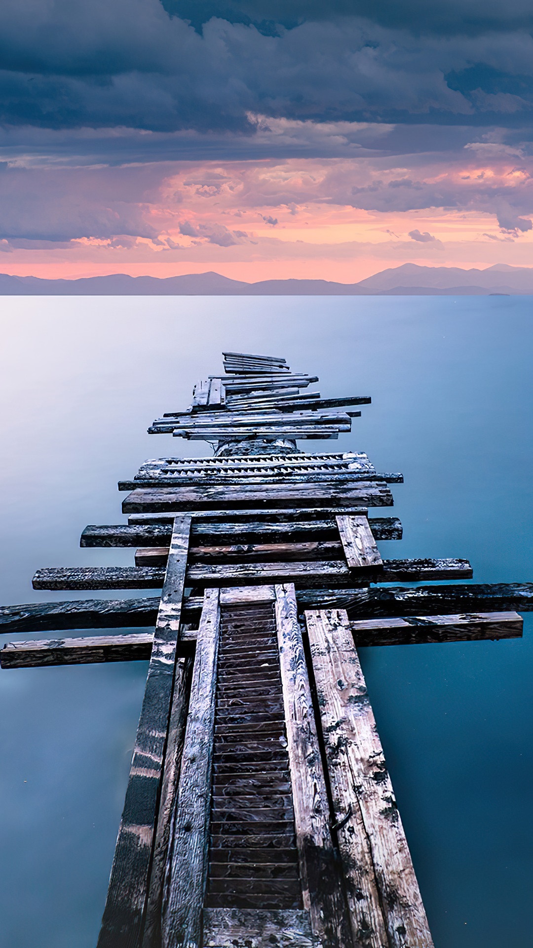 Old wooden pier on a calm sea at sunset HD Phone Wallpaper