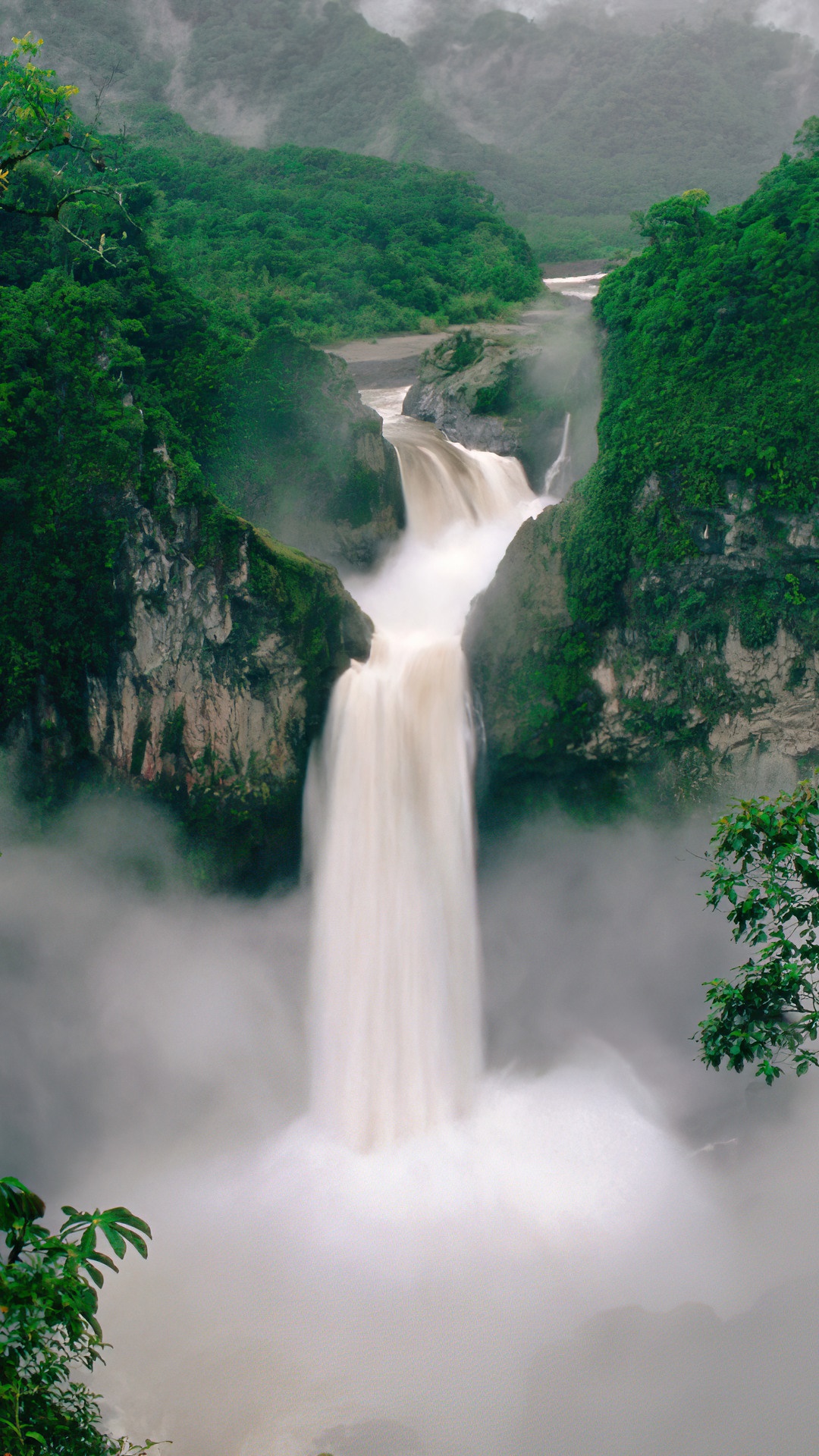 Waterfall in a lush green forest HD Phone Wallpaper