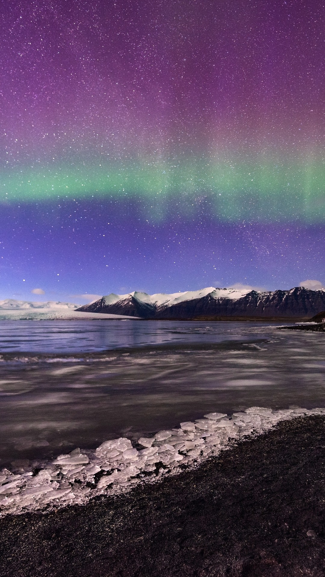 Aurora Borealis over a Glacier and Snowy Mountains HD Phone Wallpaper