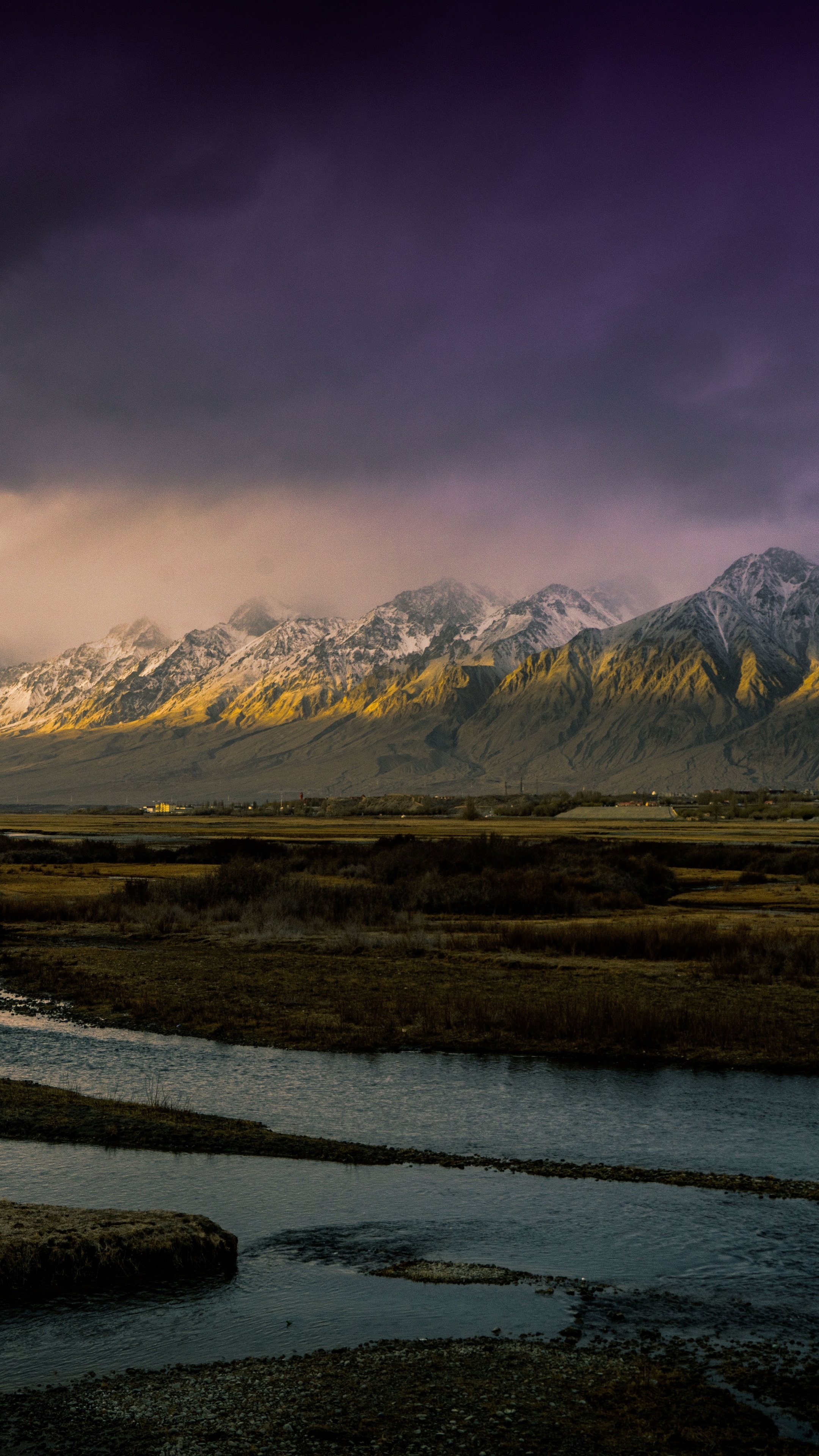 Snow-capped mountains at sunrise over a river HD Phone Wallpaper
