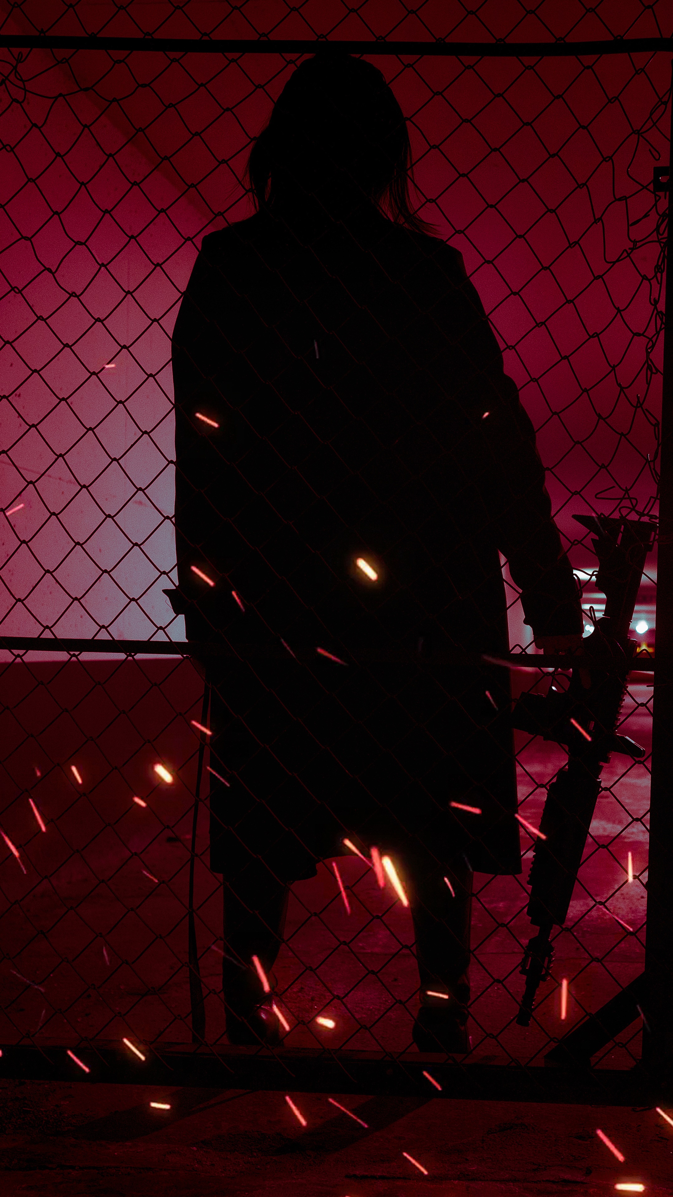 Silhouette of a person holding a rifle HD Phone Wallpaper