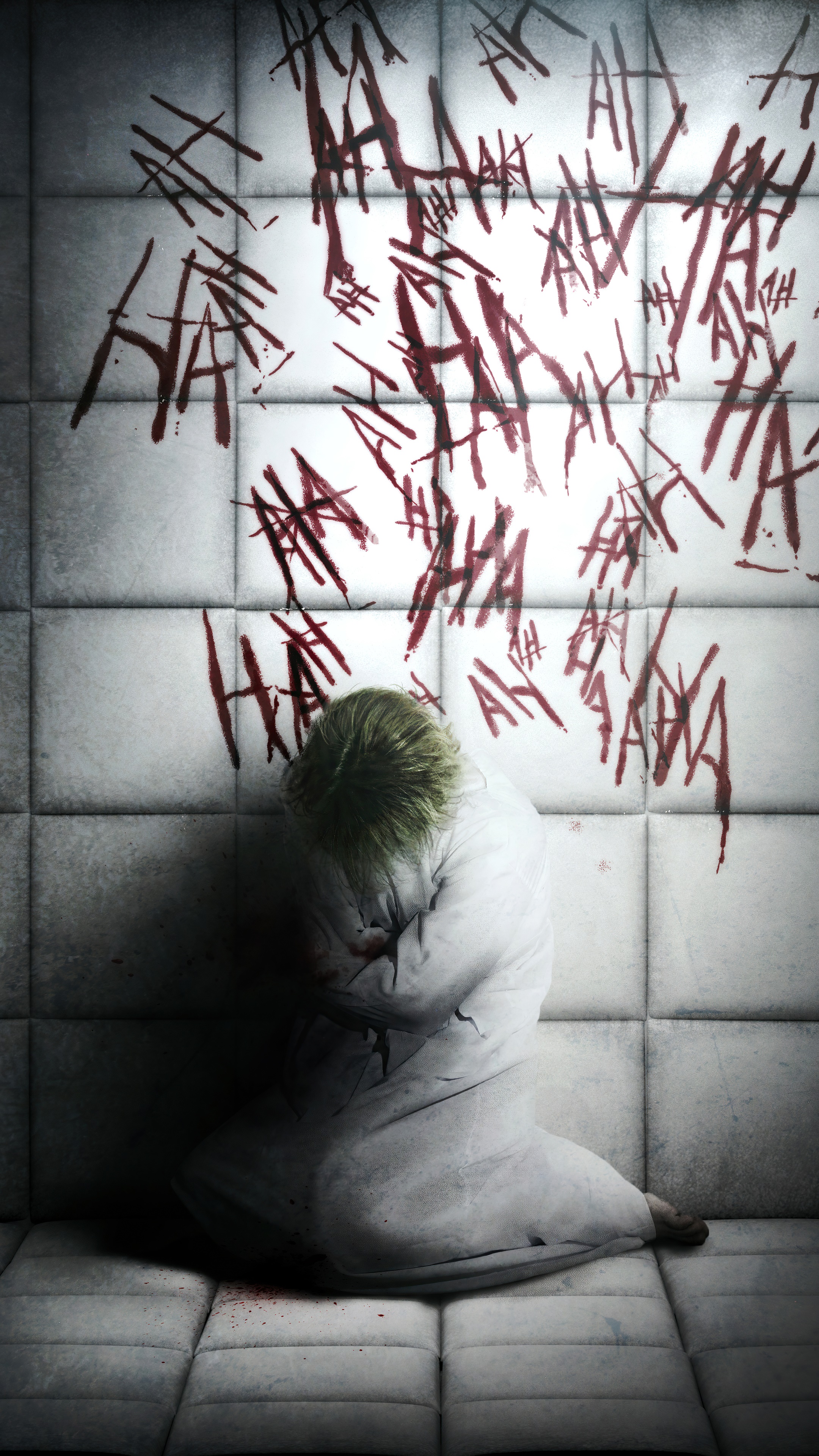 Joker in a straitjacket with 'HA' scribbled on the walls HD Phone Wallpaper