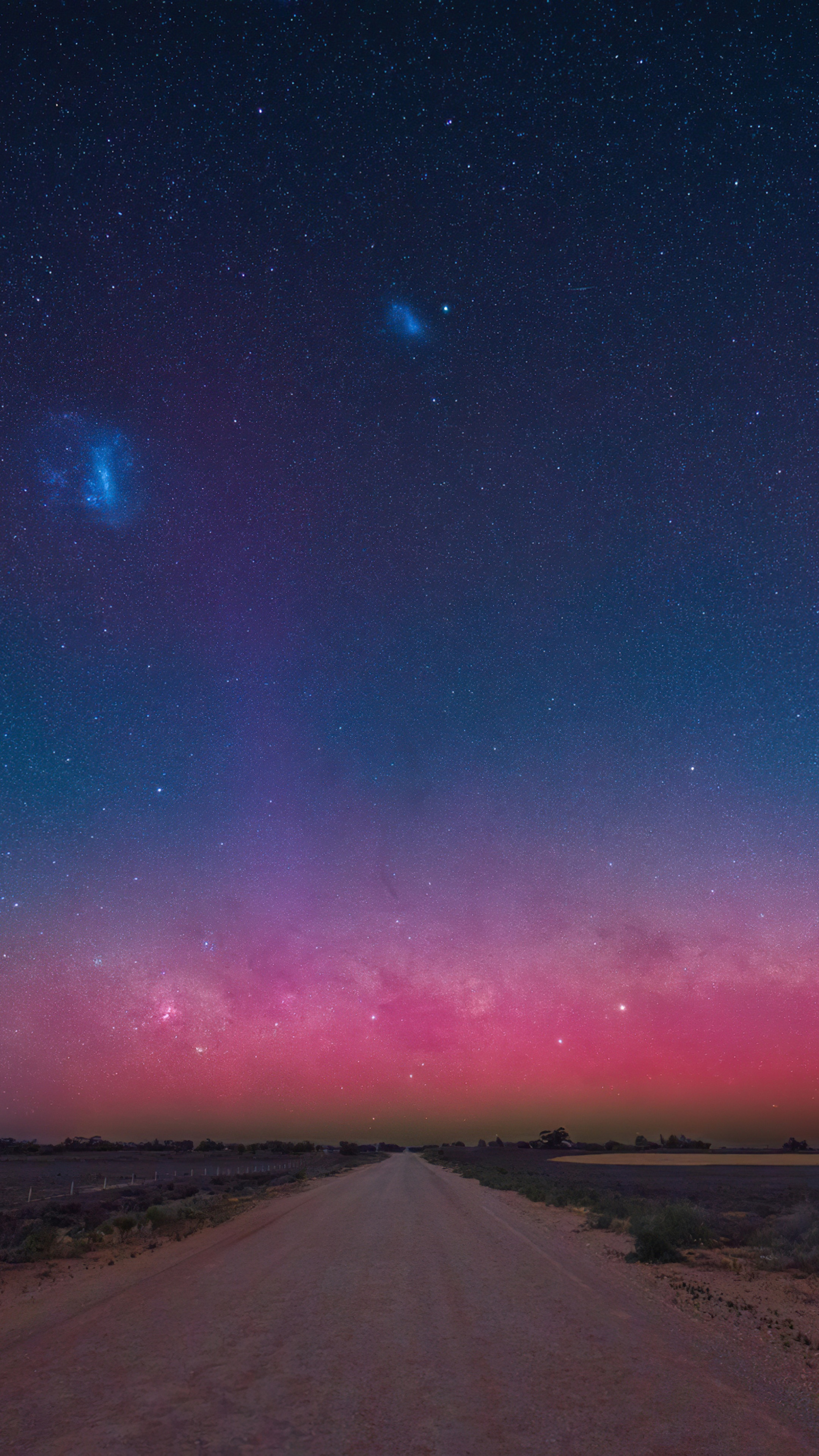 Milky Way over a dirt road at night 4K HD Phone Wallpaper