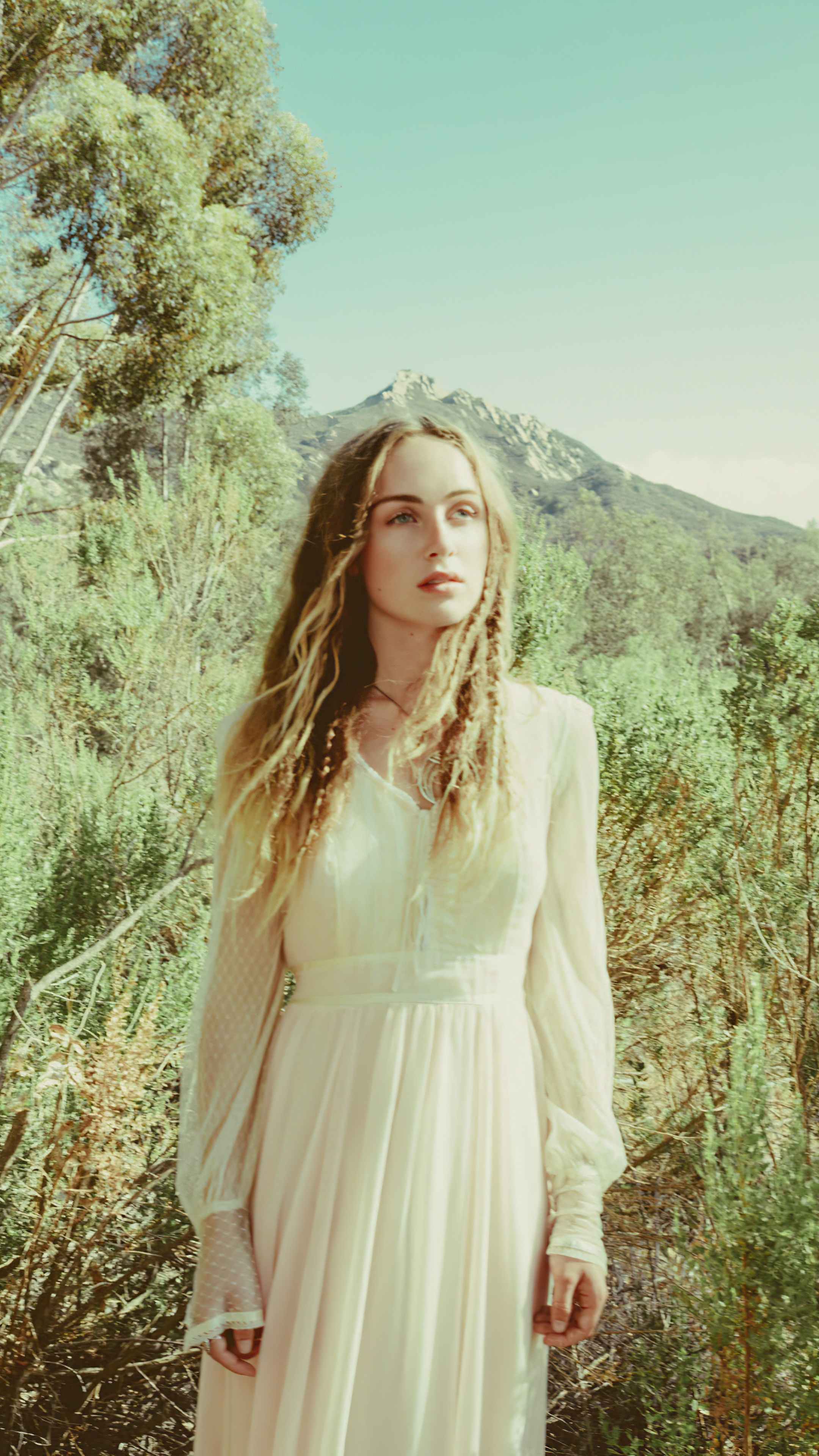 Zella Day in a white dress outdoors HD Phone Wallpaper