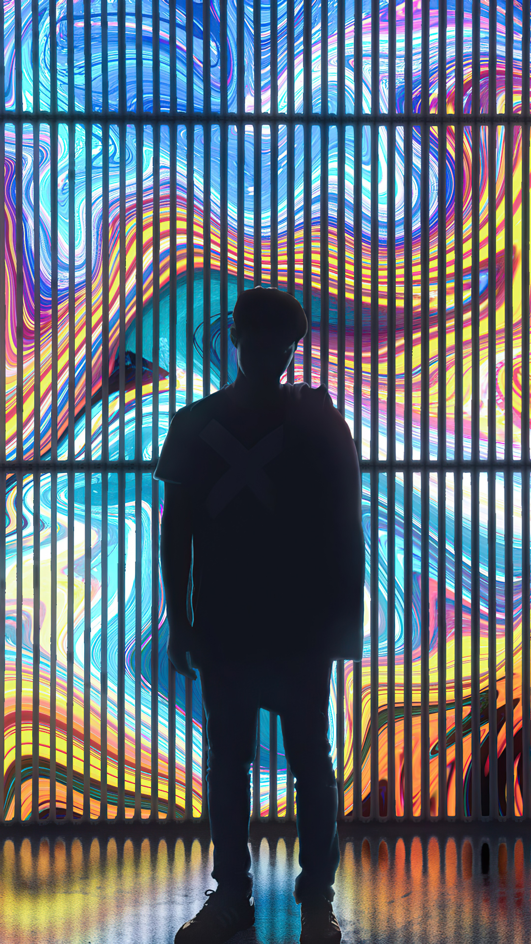 Silhouette of a person against a colorful digital art background HD Phone Wallpaper