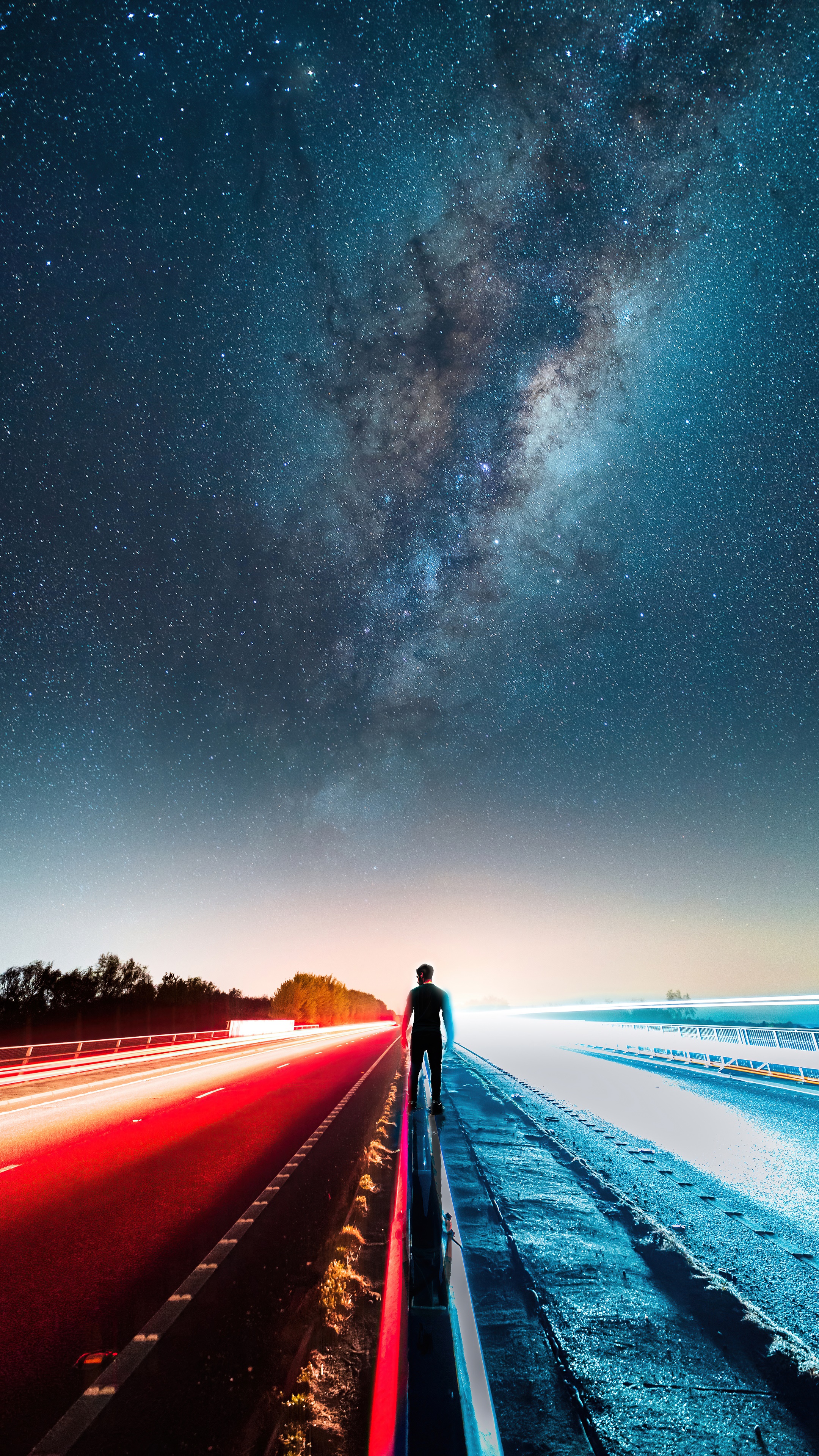 Man standing on a road under the Milky Way HD Phone Wallpaper
