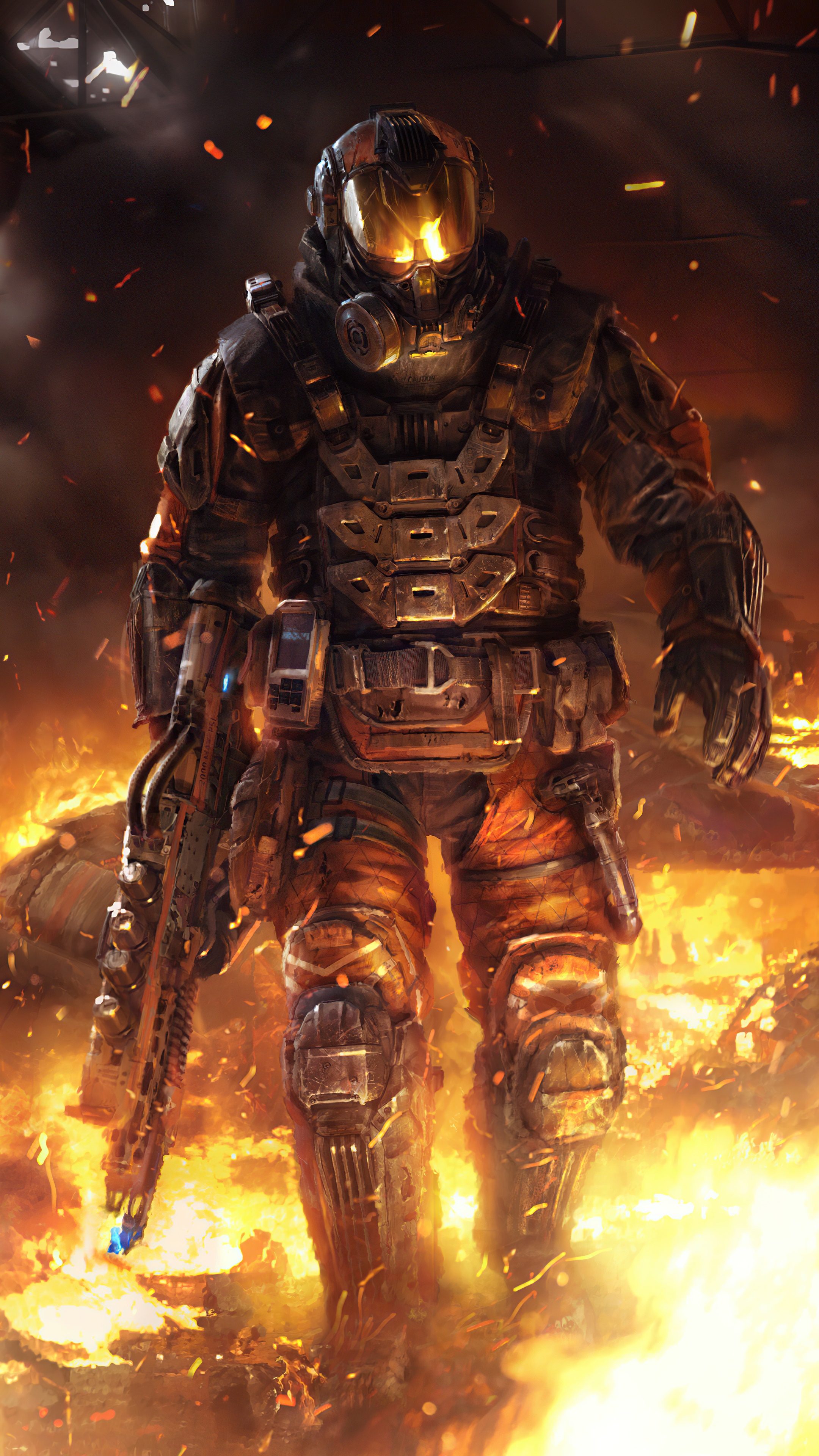 Soldier in armor with a rifle in a fiery environment HD Phone Wallpaper