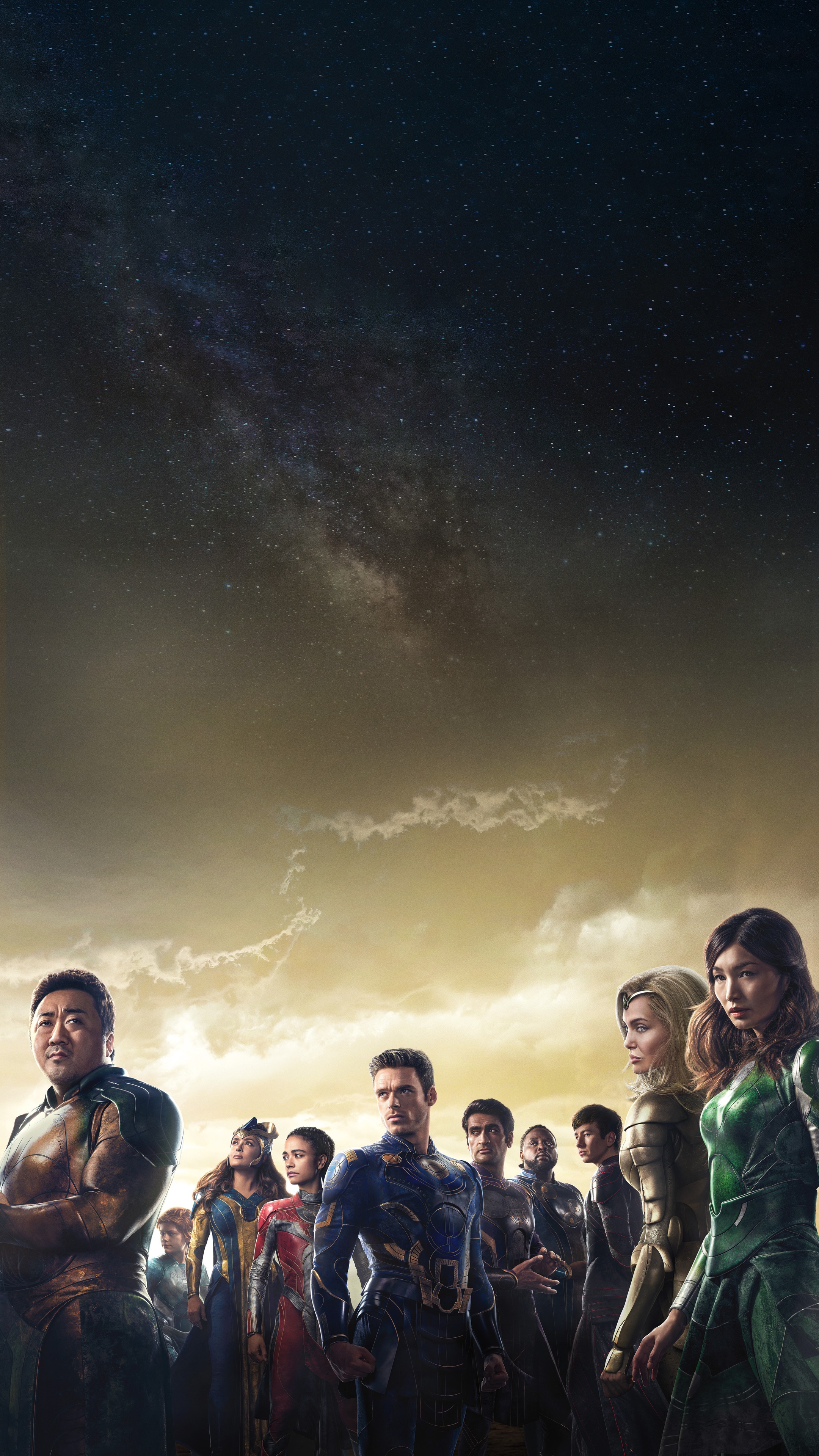 The Eternals standing under a starry sky HD Phone Wallpaper