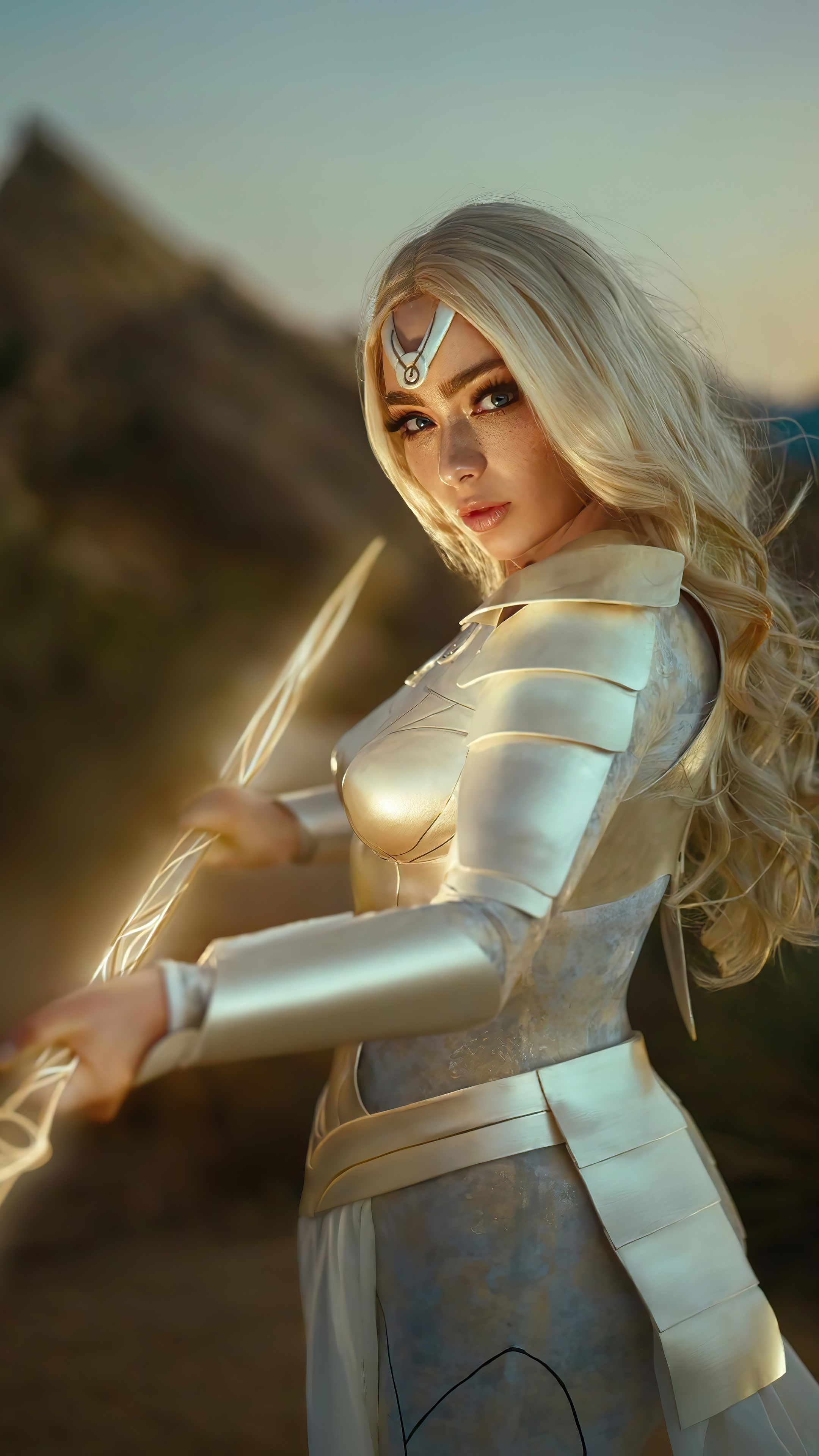 Thena from Eternals cosplay with glowing staff HD Phone Wallpaper