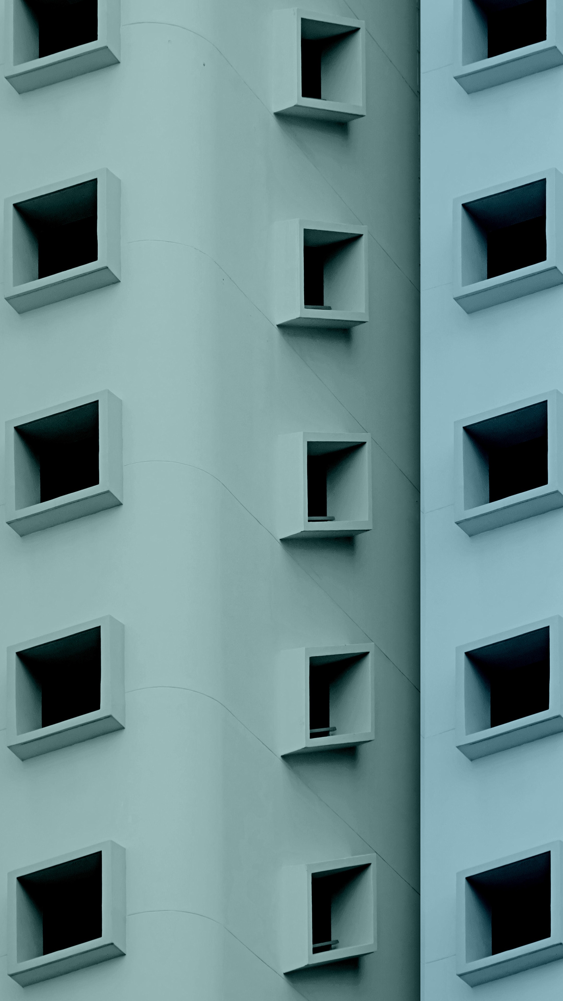 Minimalist building facade with square windows HD Phone Wallpaper