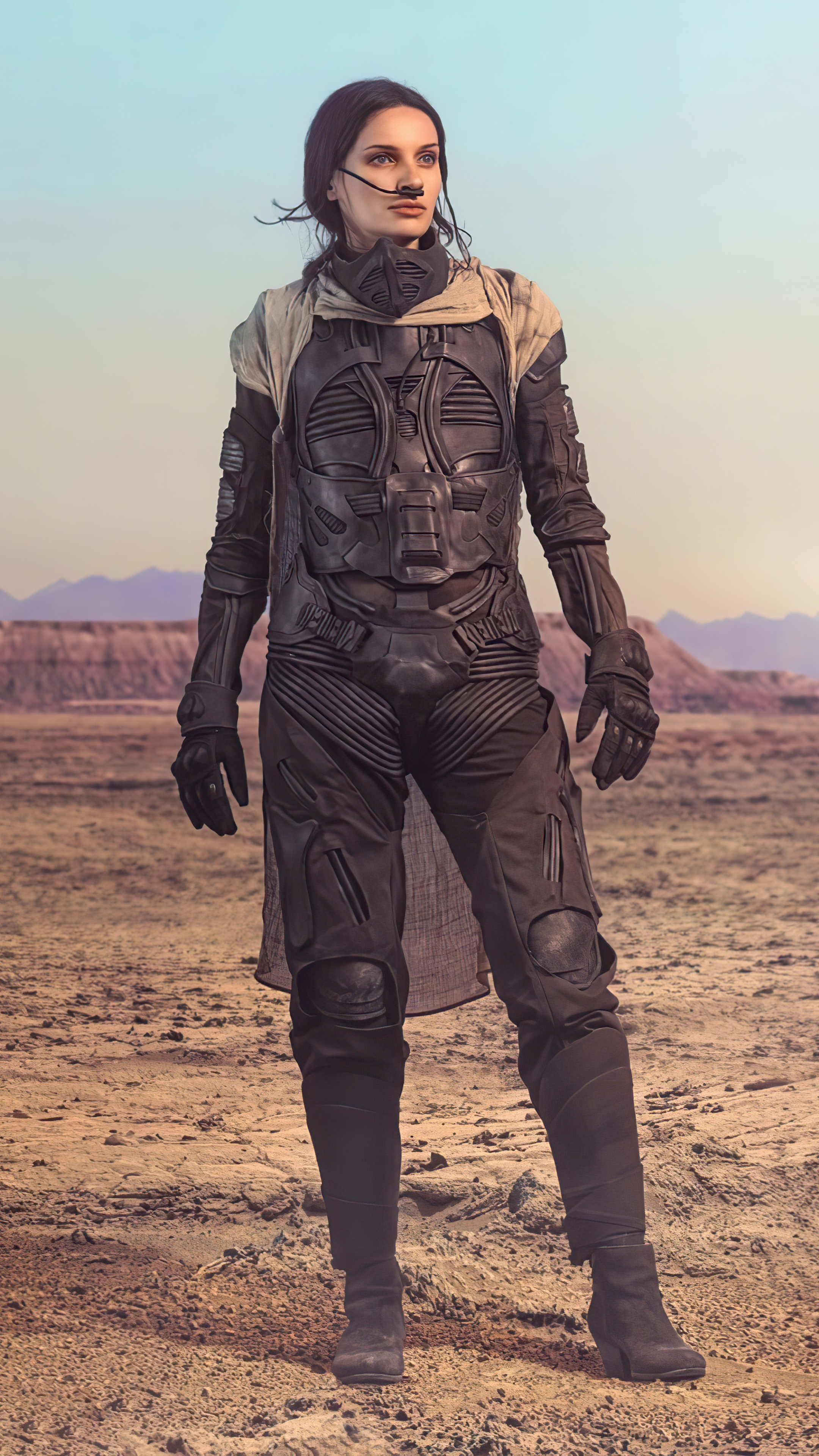 Woman in Dune costume in desert HD Phone Wallpaper