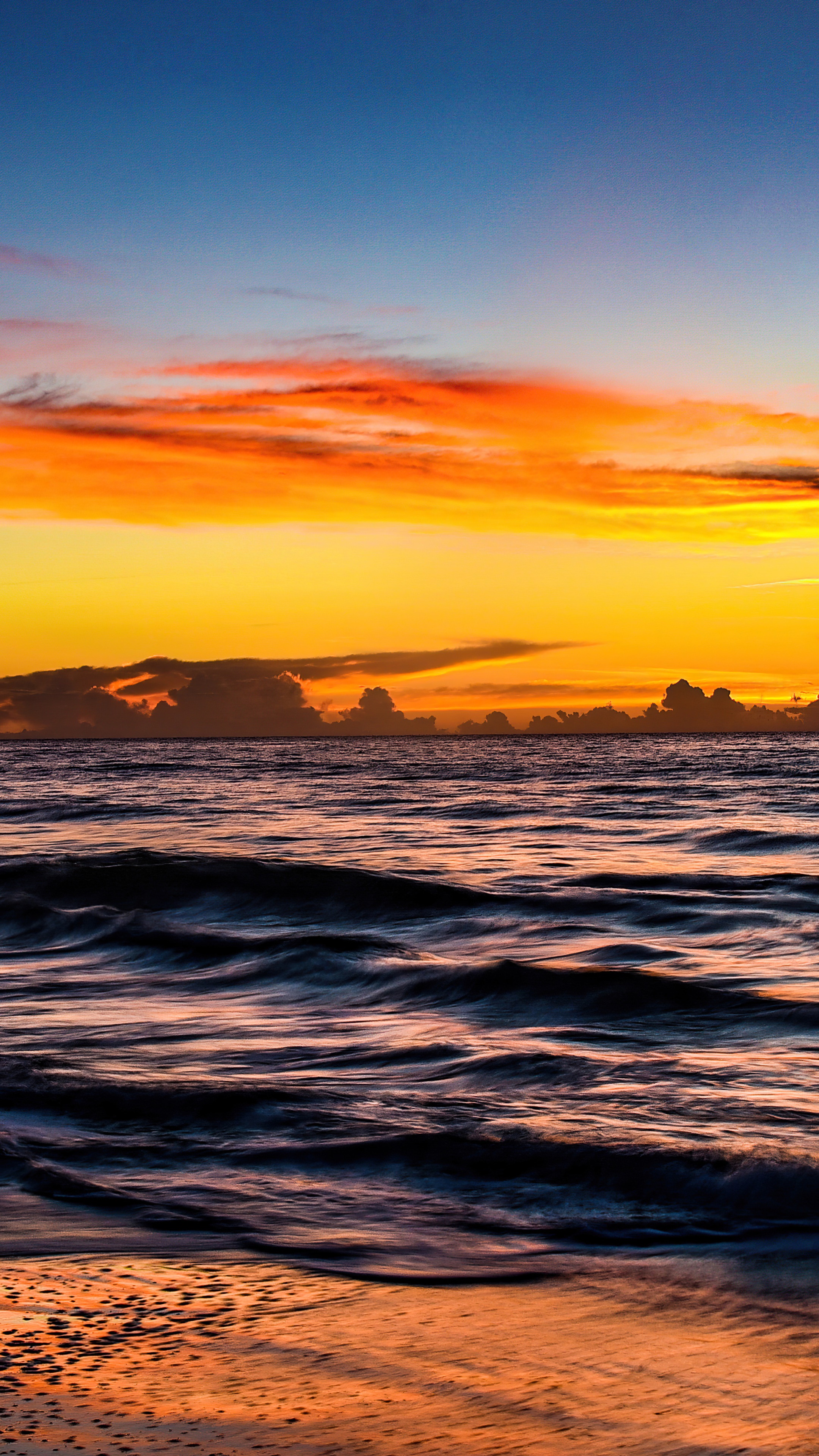 Ocean sunset with colorful clouds and waves 4K HD Phone Wallpaper