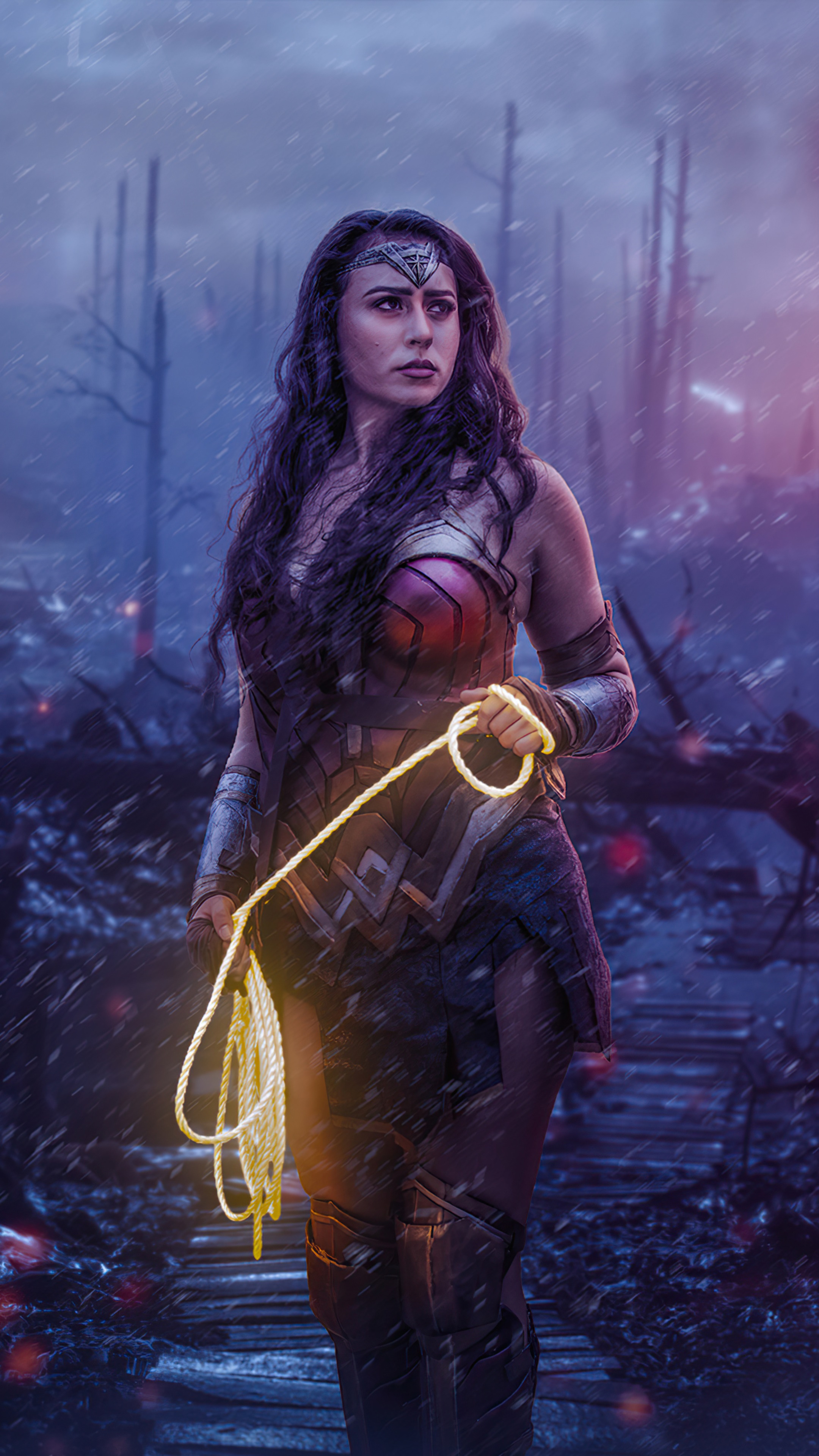 Wonder Woman with Lasso in a War-Torn Landscape HD Phone Wallpaper