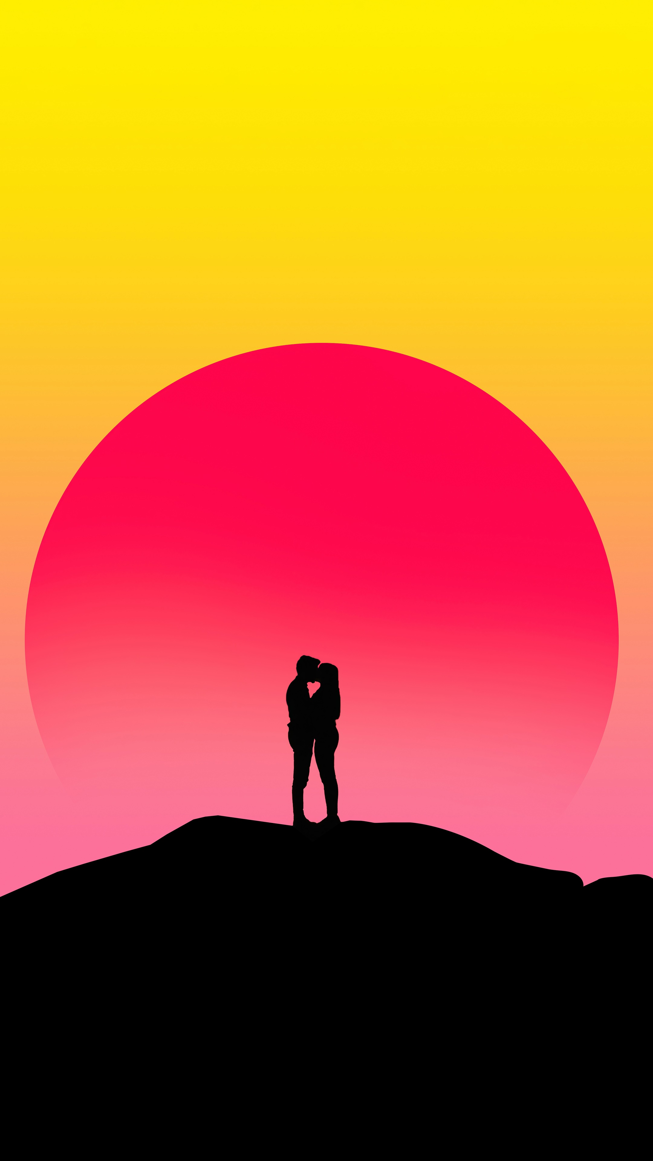 Couple kissing on a hill at sunset HD Phone Wallpaper