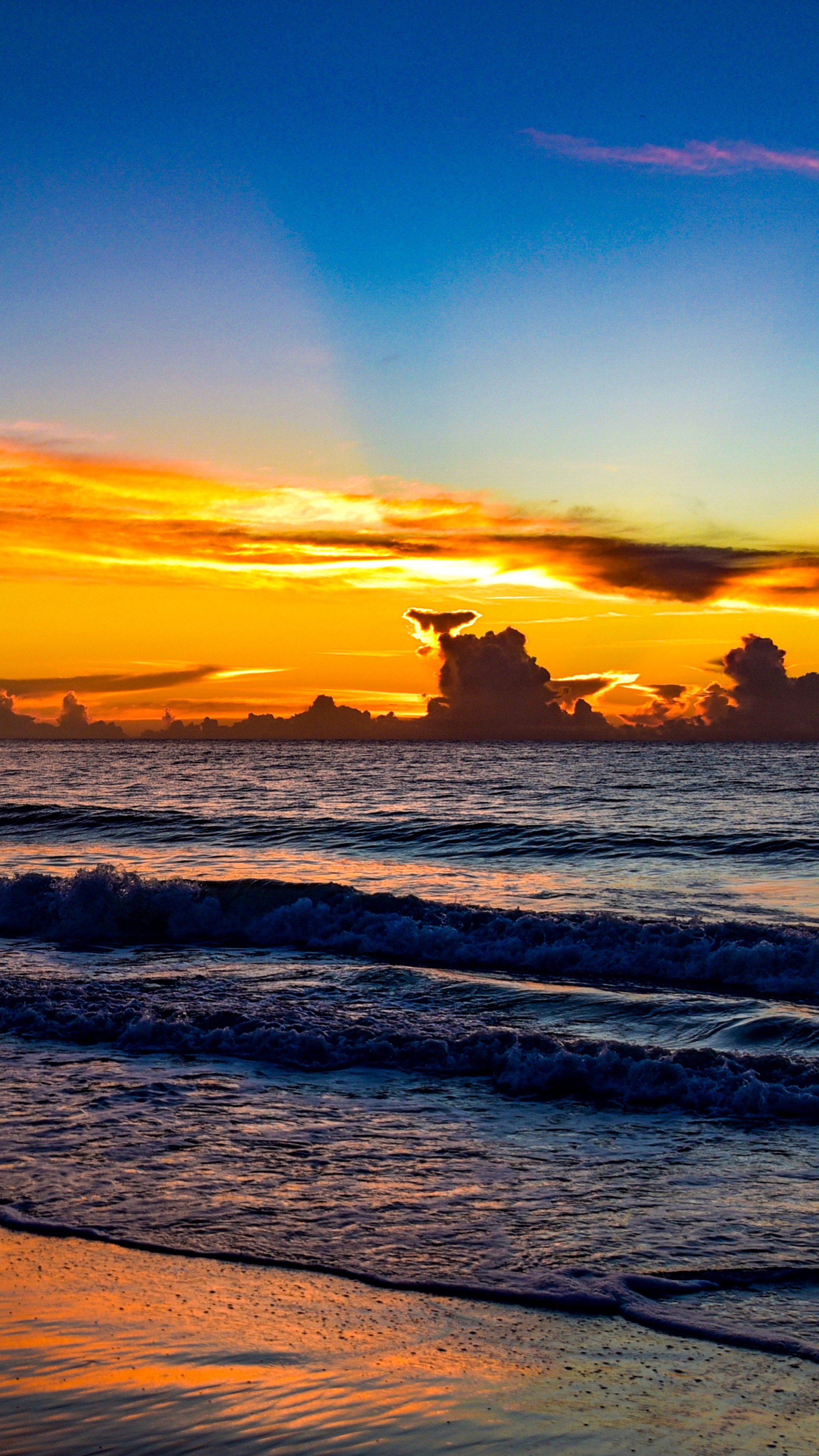Sunset over the ocean with colorful clouds HD Phone Wallpaper
