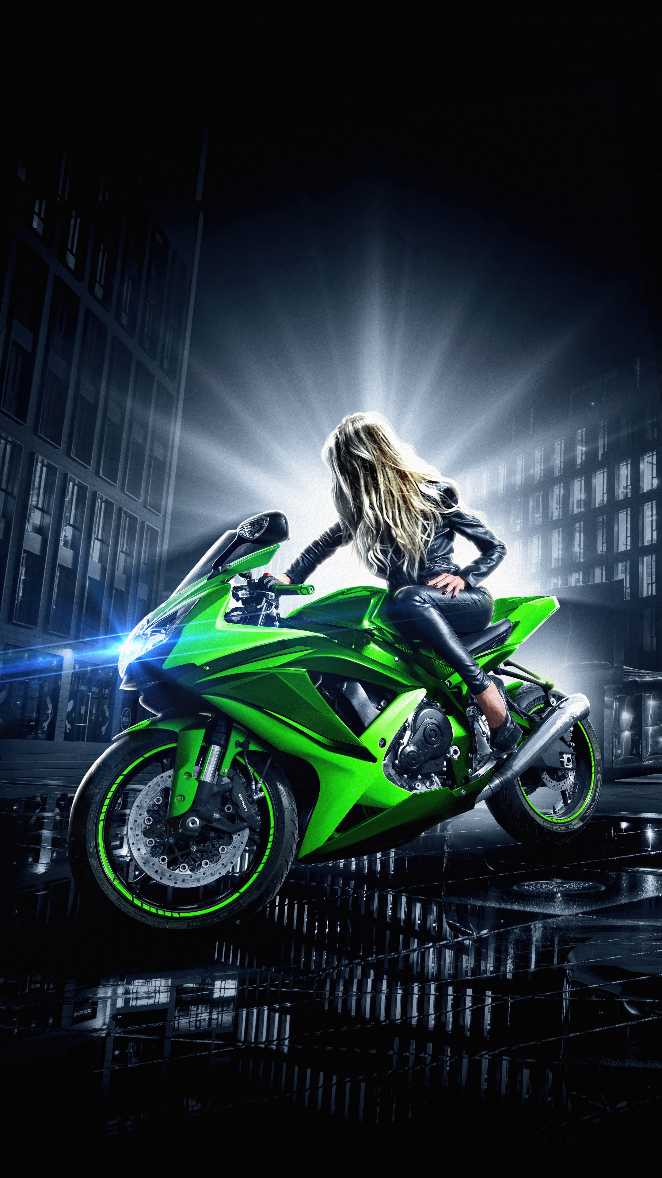 Woman on a green Kawasaki motorcycle in a city at night HD Phone Wallpaper