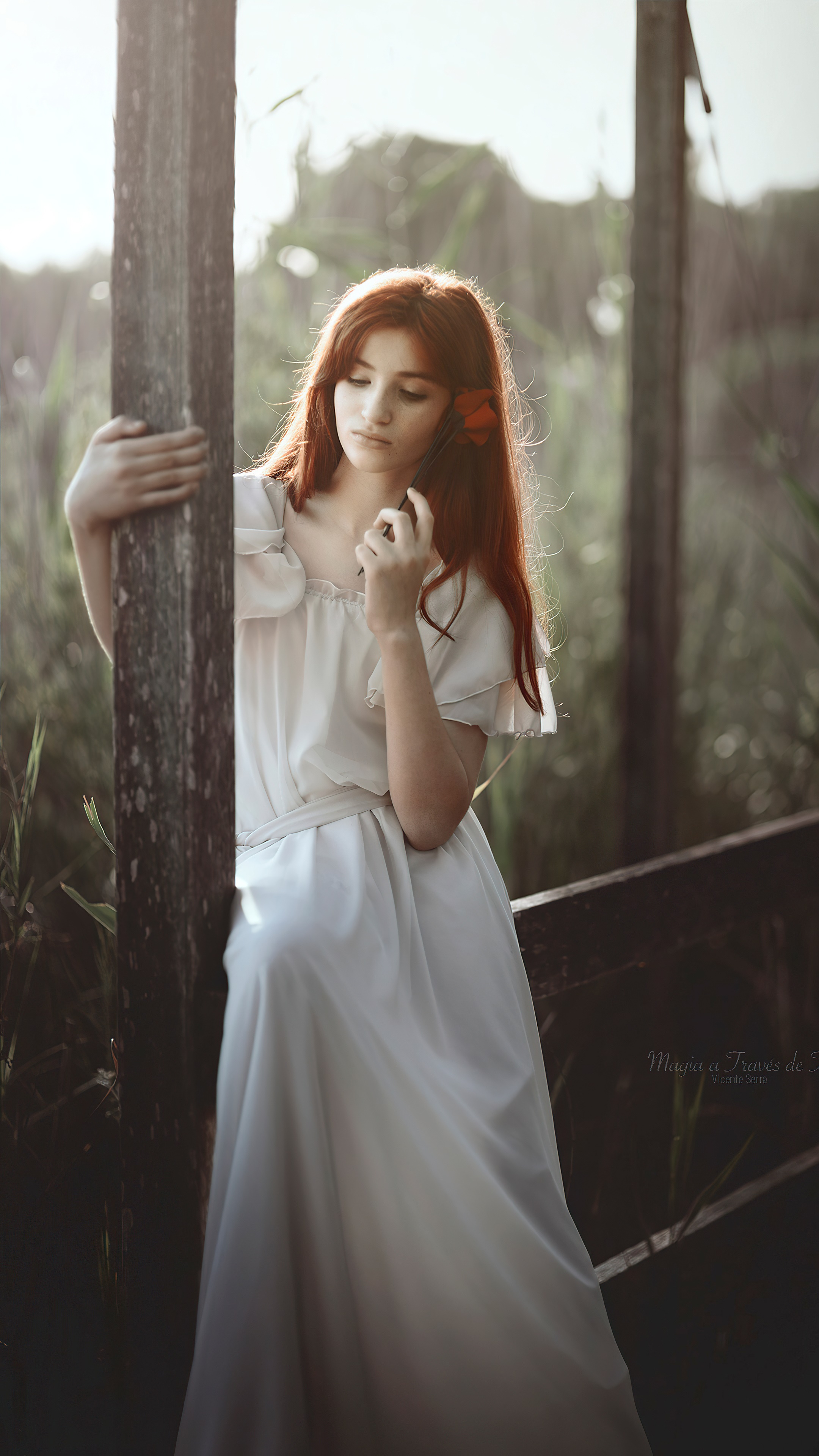 Girl with red hair and a rose in her hair HD Phone Wallpaper