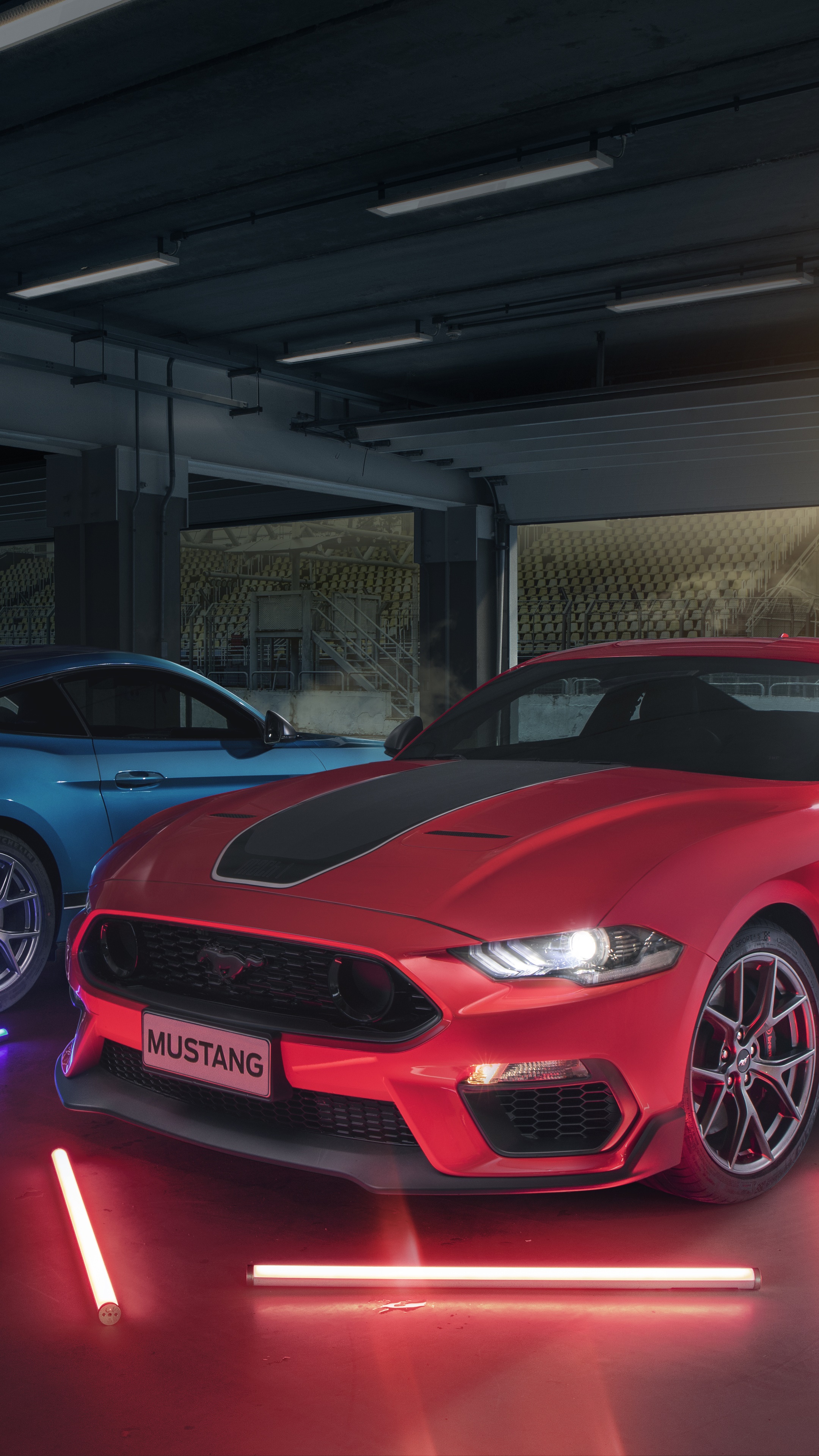 Ford Mustang Mach 1 and blue Ford Mustang in garage HD Phone Wallpaper