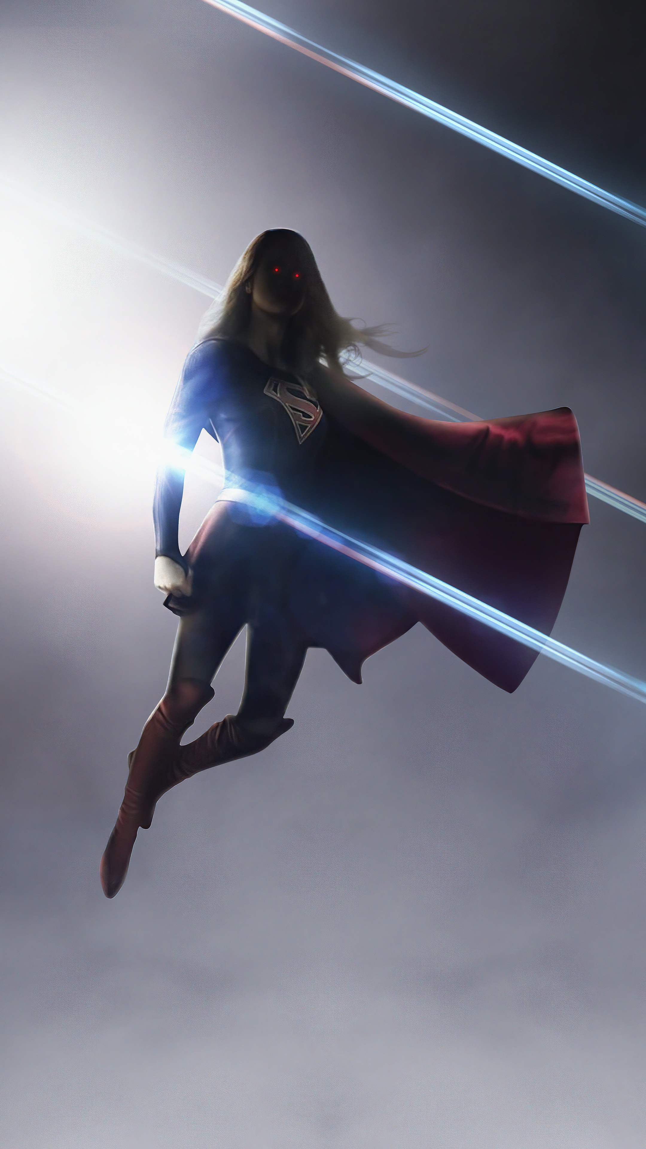 Supergirl flying with red eyes and cape HD Phone Wallpaper