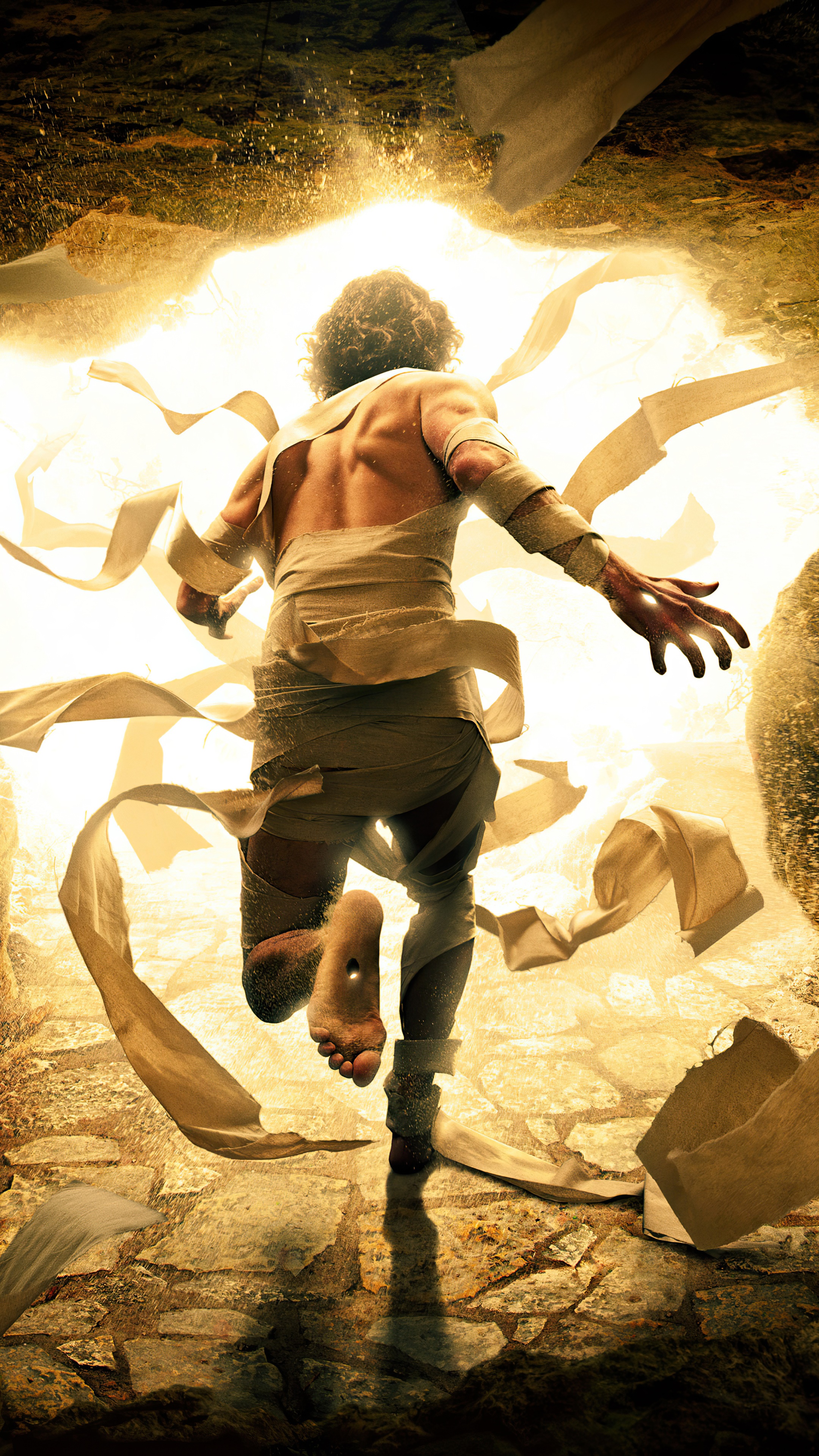 Man emerging from a tomb, wrapped in bandages HD Phone Wallpaper