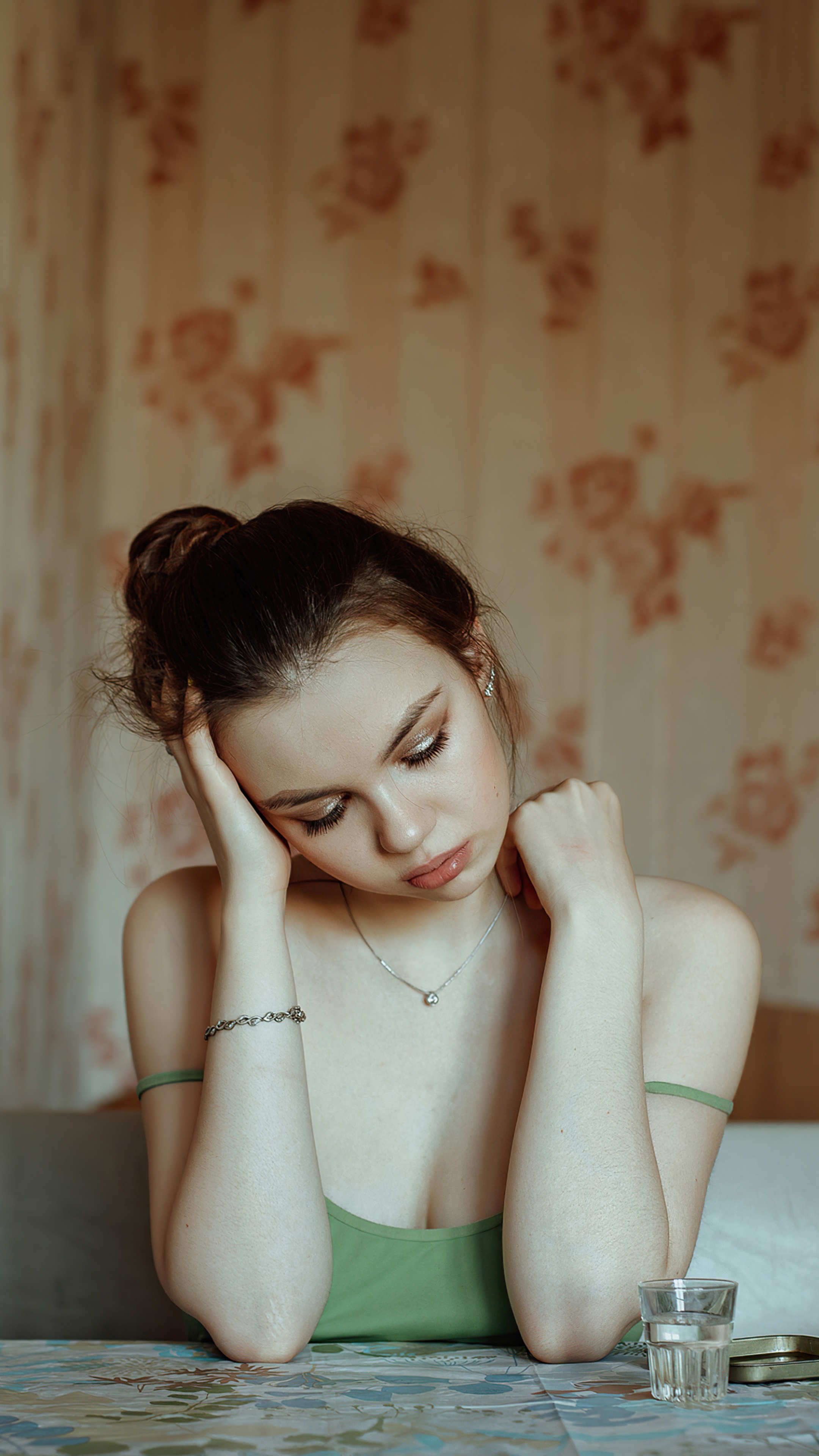 Young woman with hair in a bun HD Phone Wallpaper