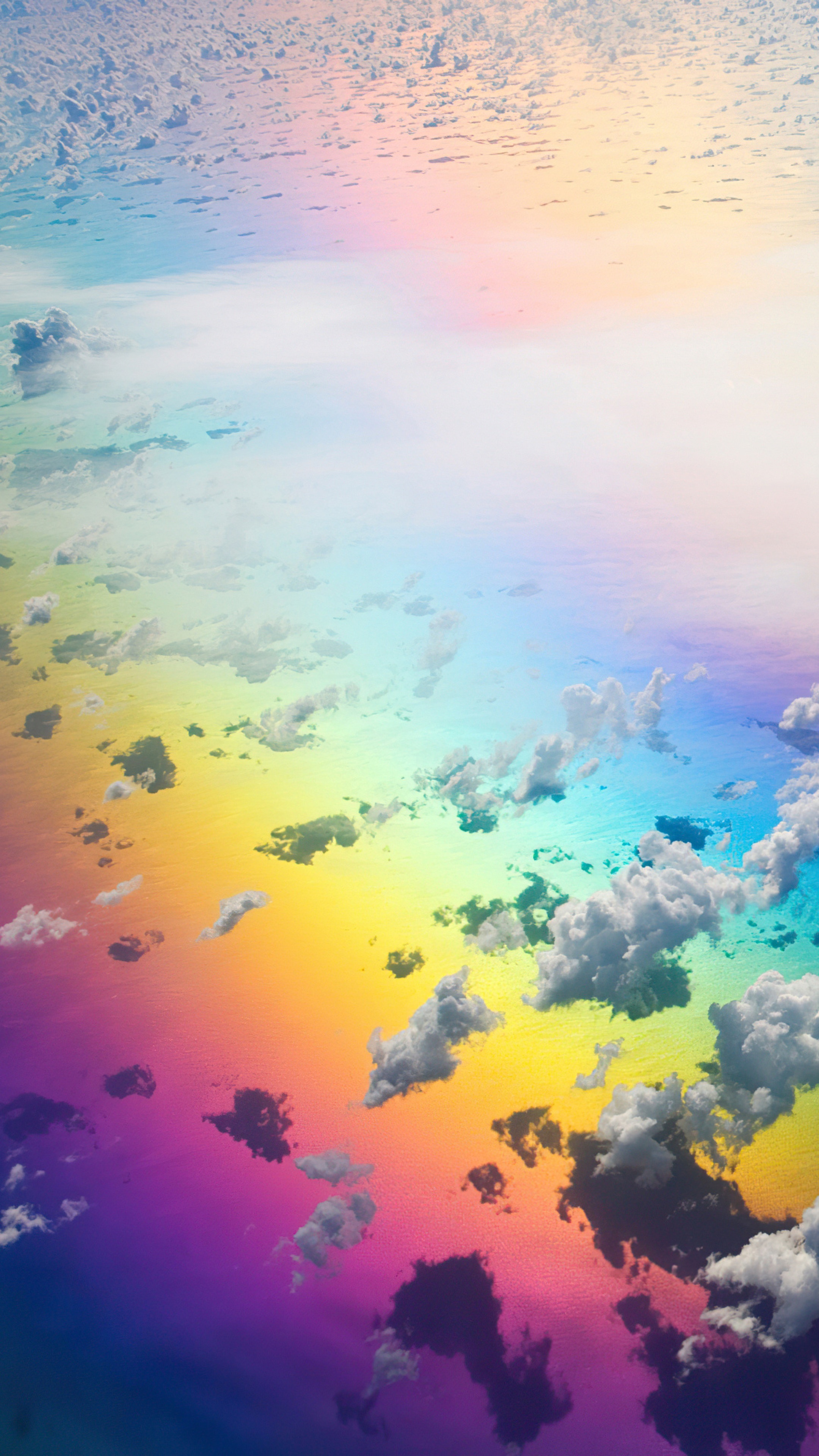 Rainbow reflection on clouds from above HD Phone Wallpaper