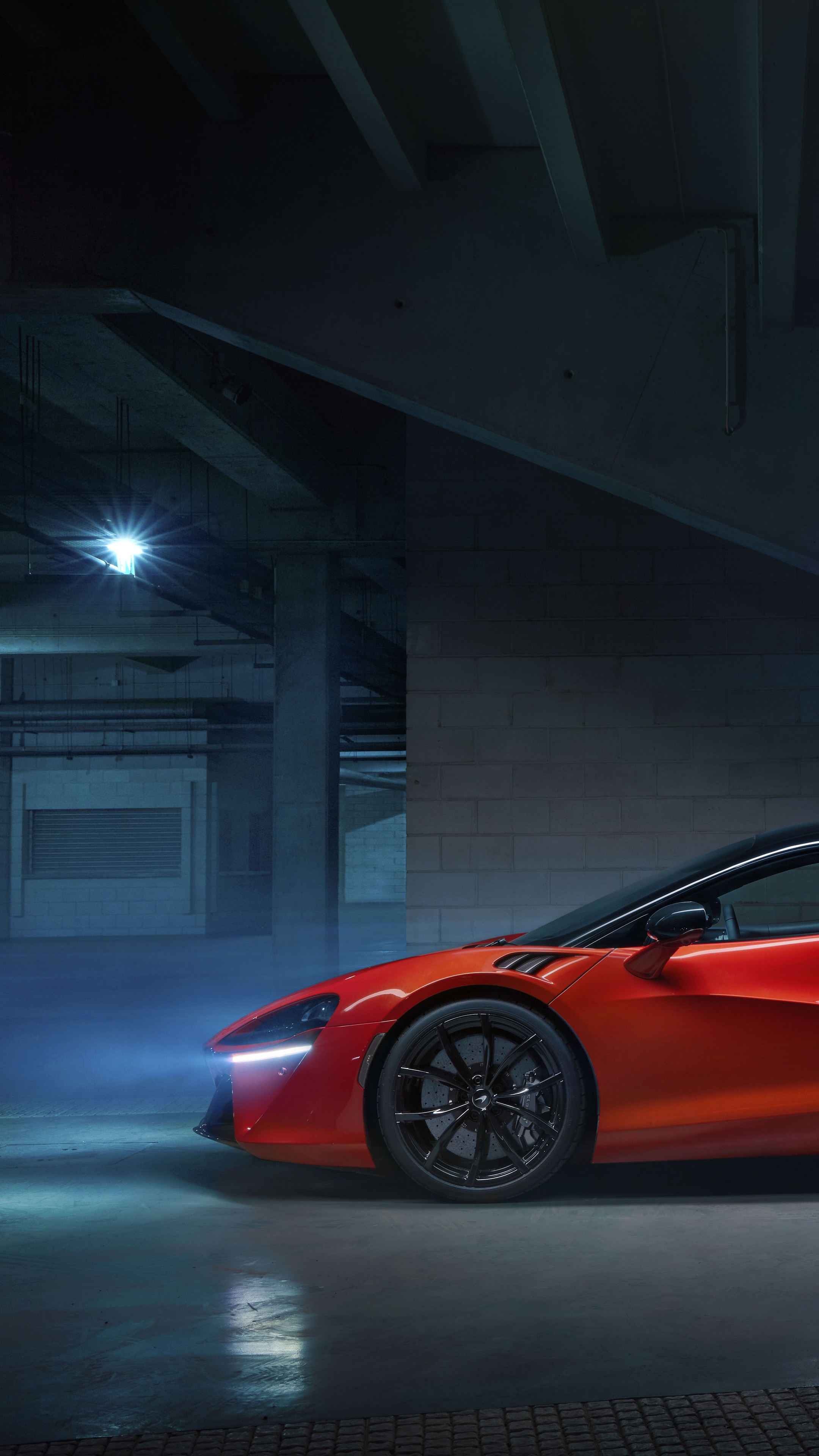 McLaren Artura sports car in a parking garage HD Phone Wallpaper
